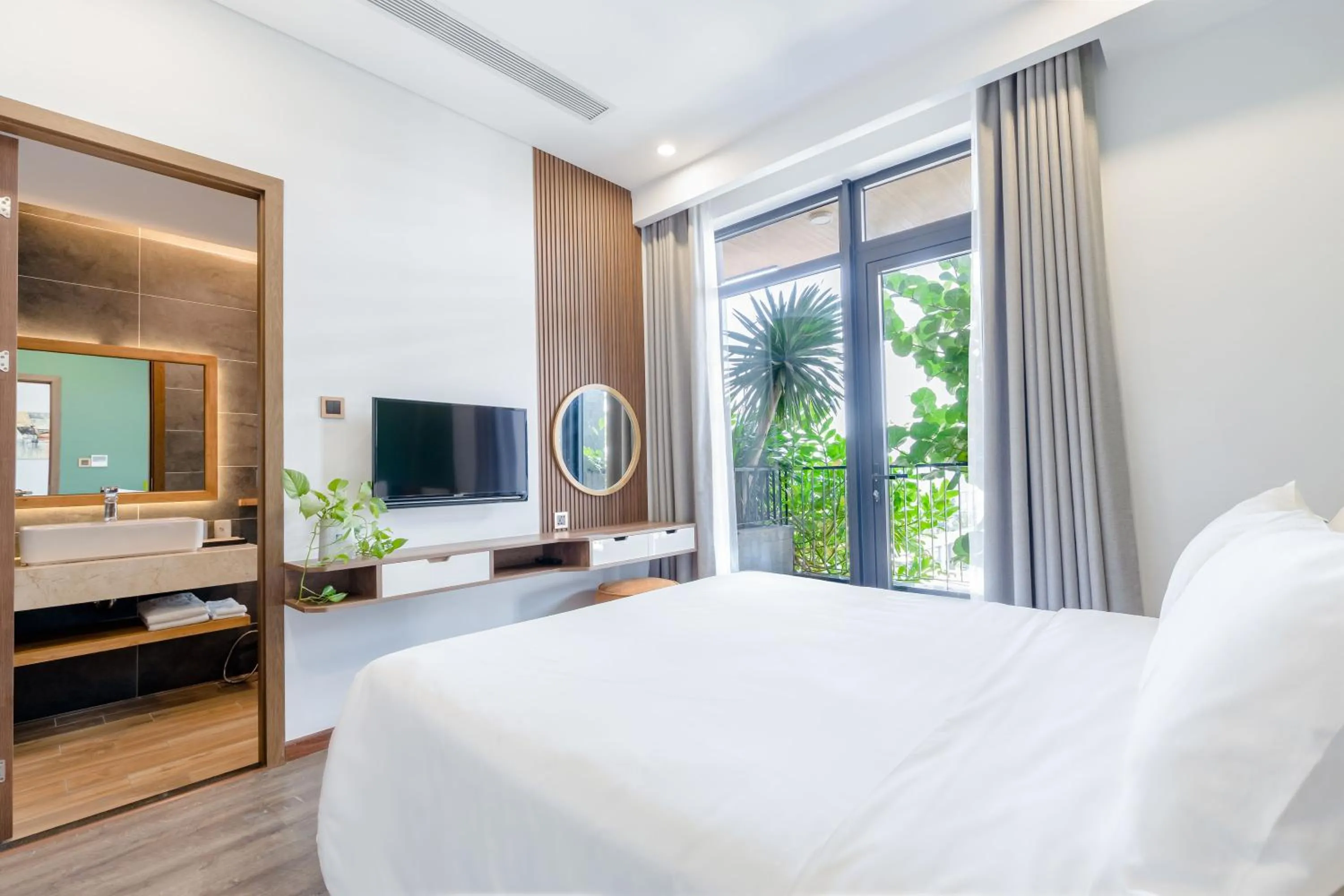 Bed in Chi House Danang Hotel and Apartment