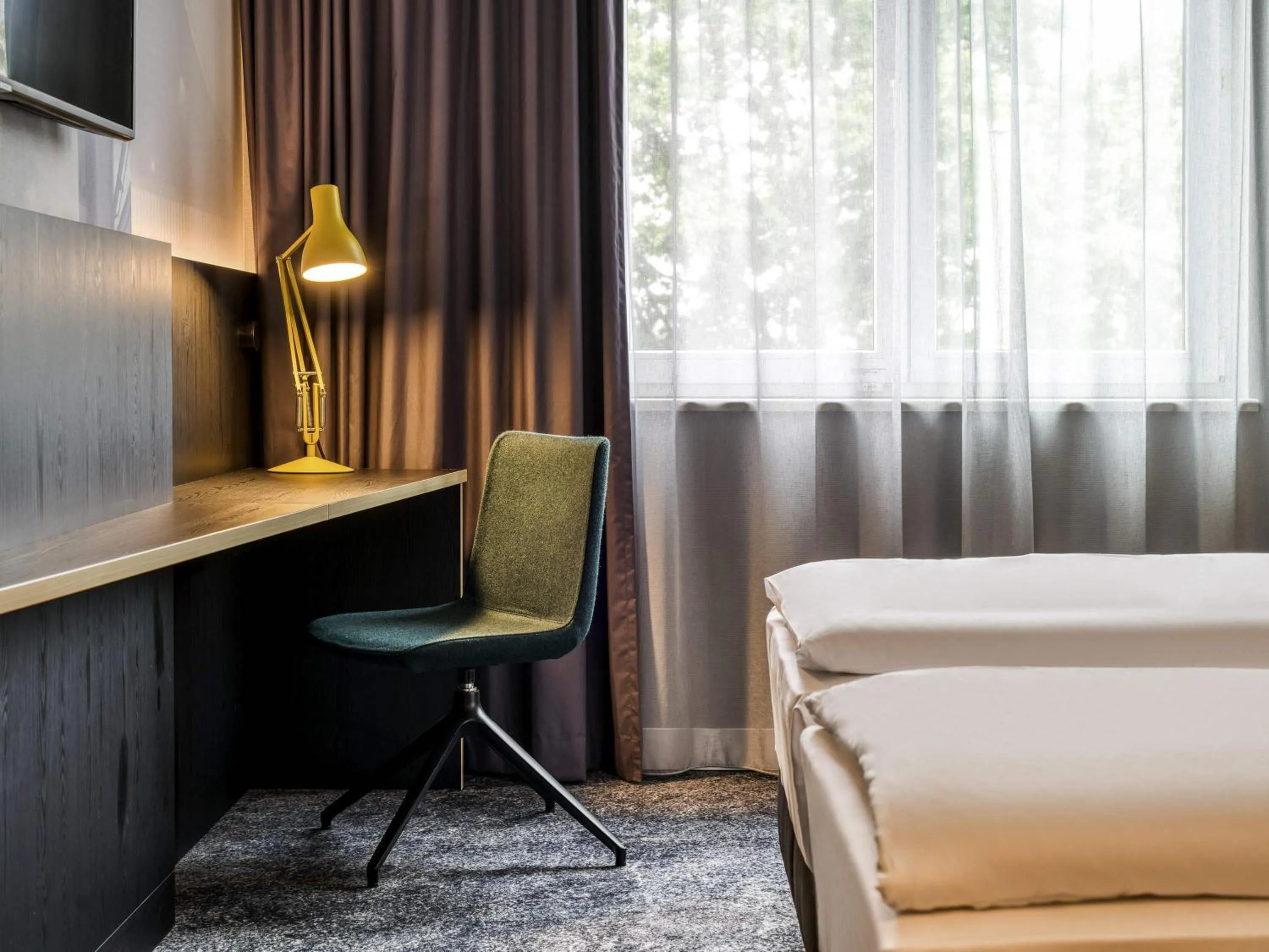 Bedroom in Mercure Neu-Isenburg