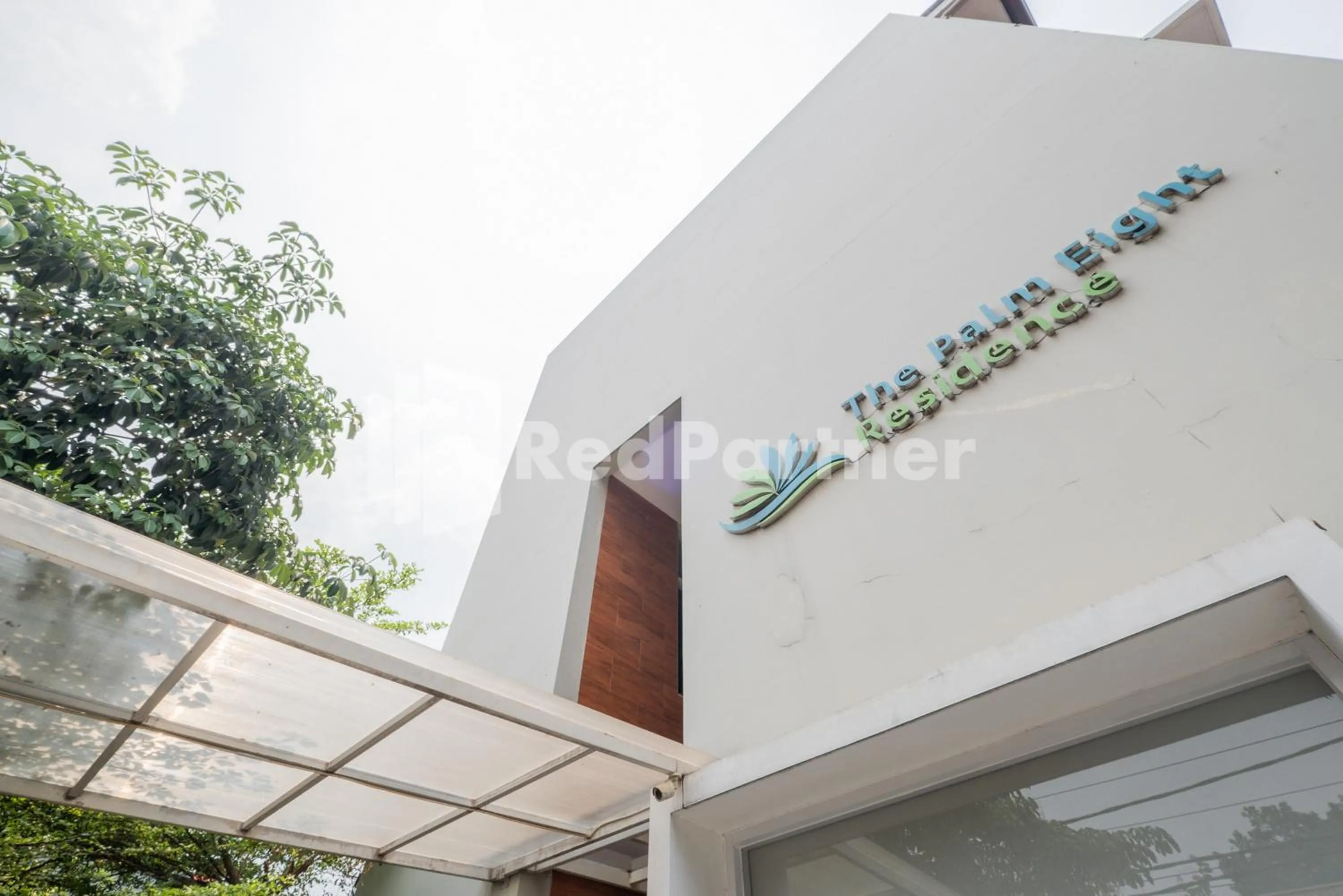 Property building in Palm Eight Mitra RedDoorz