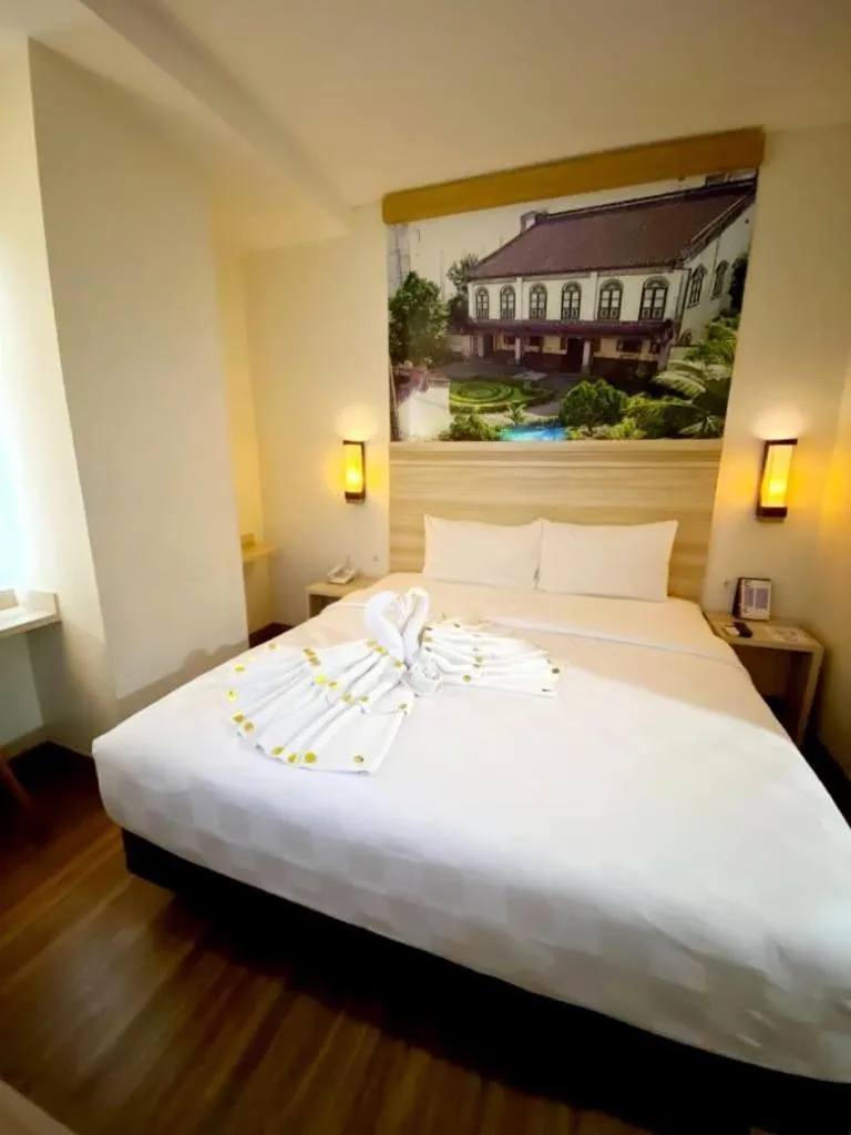 Bed in Cordela Inn Millennium Medan