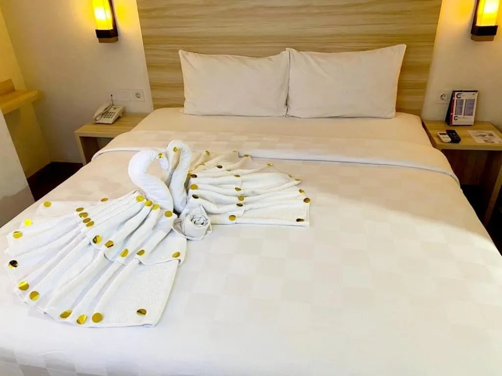 Bed in Cordela Inn Millennium Medan