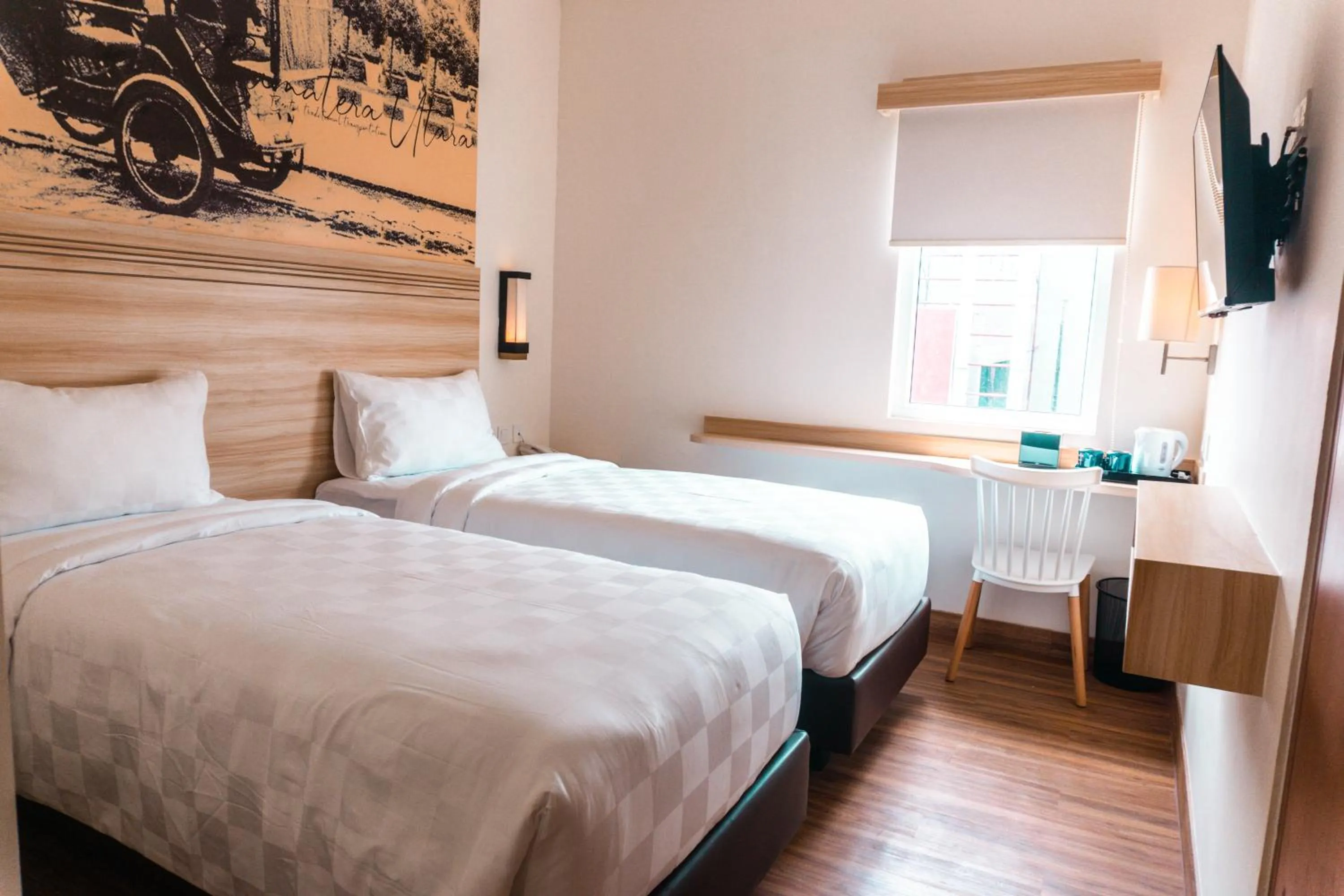 Bed in Cordela Inn Millennium Medan