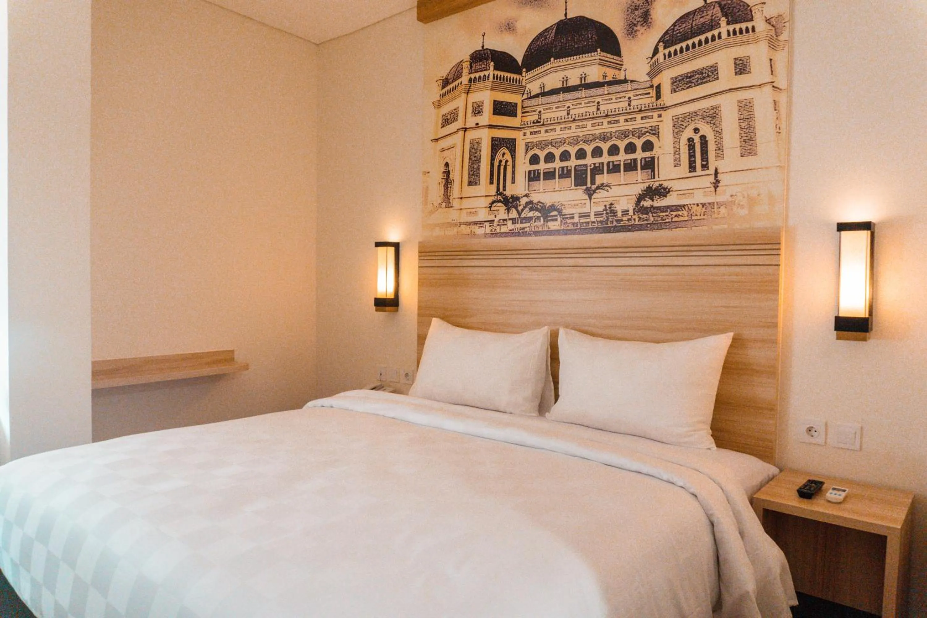 Bed in Cordela Inn Millennium Medan