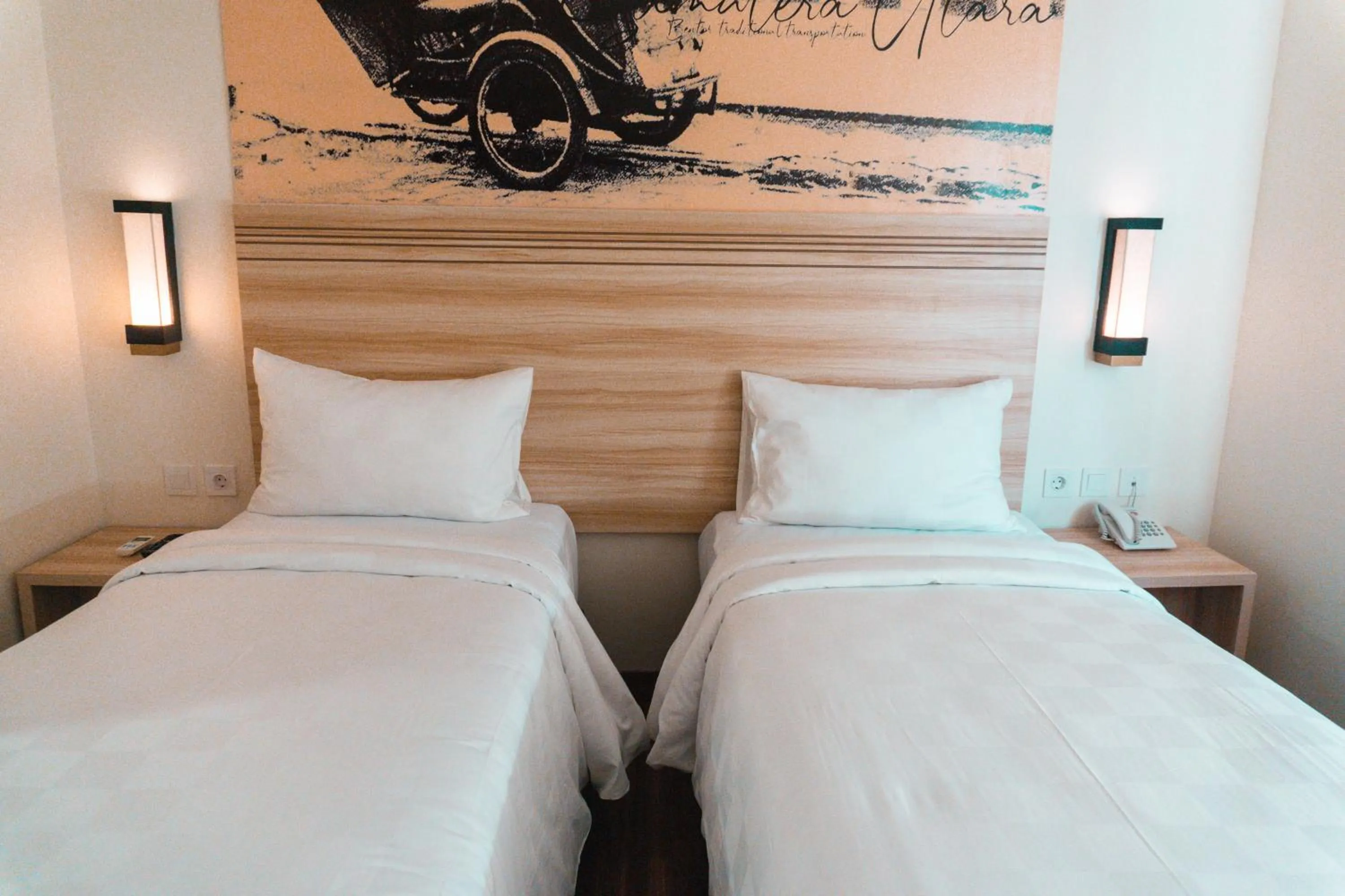 Bed in Cordela Inn Millennium Medan