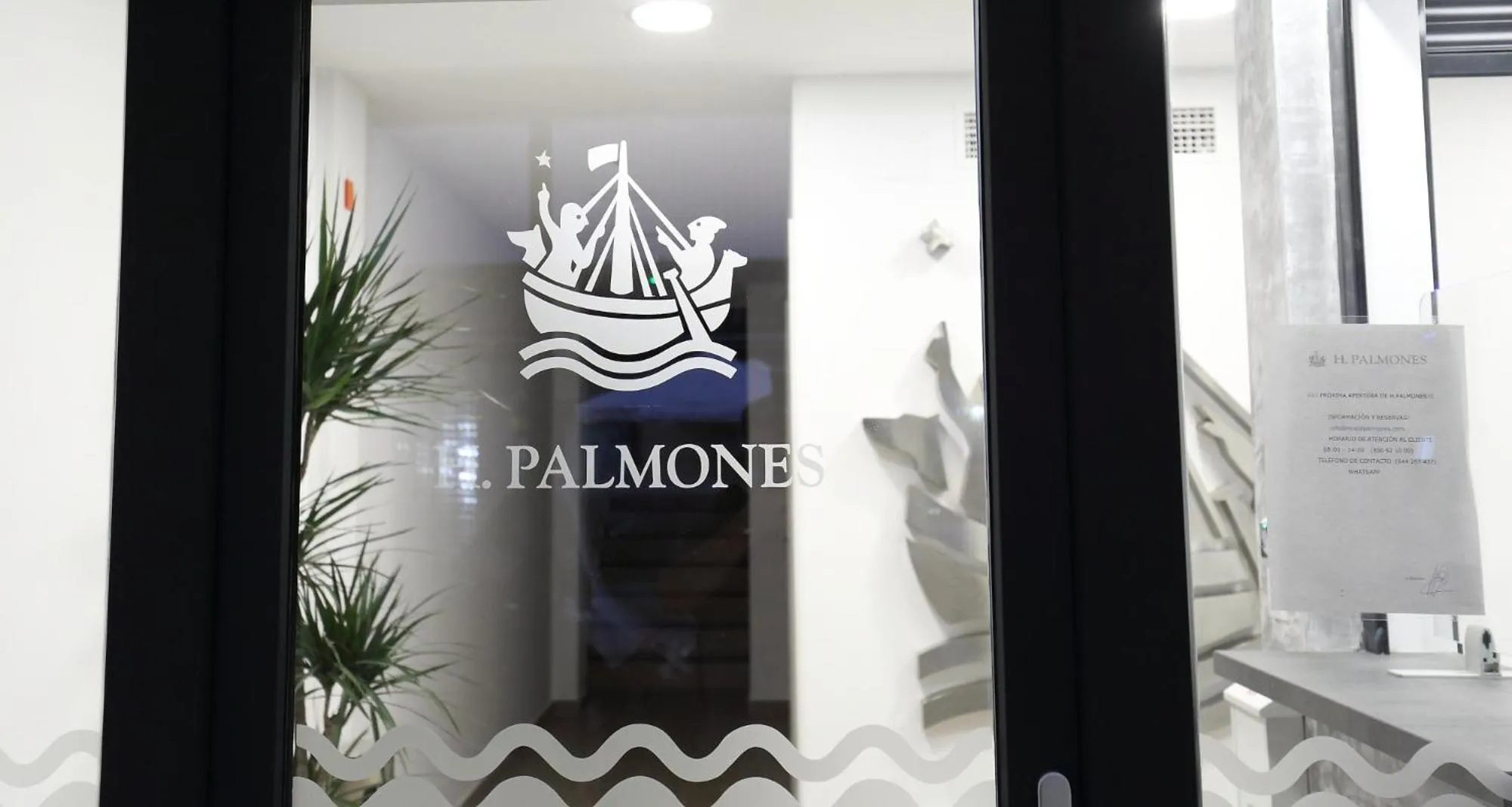 Property logo or sign in H.PALMONES