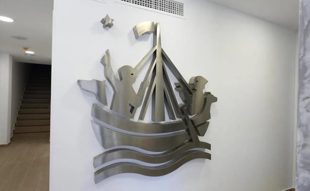 Property logo or sign in H.PALMONES