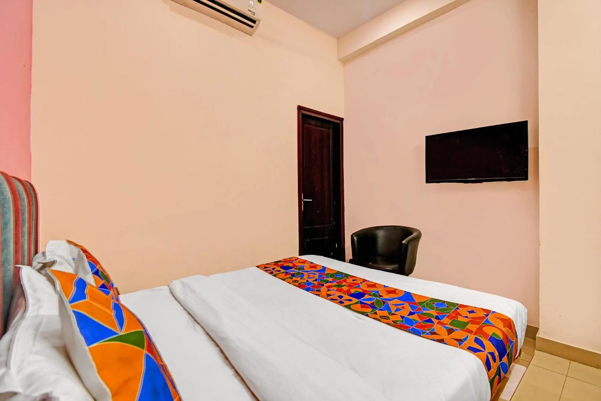 Bed in FabHotel Insight Inn