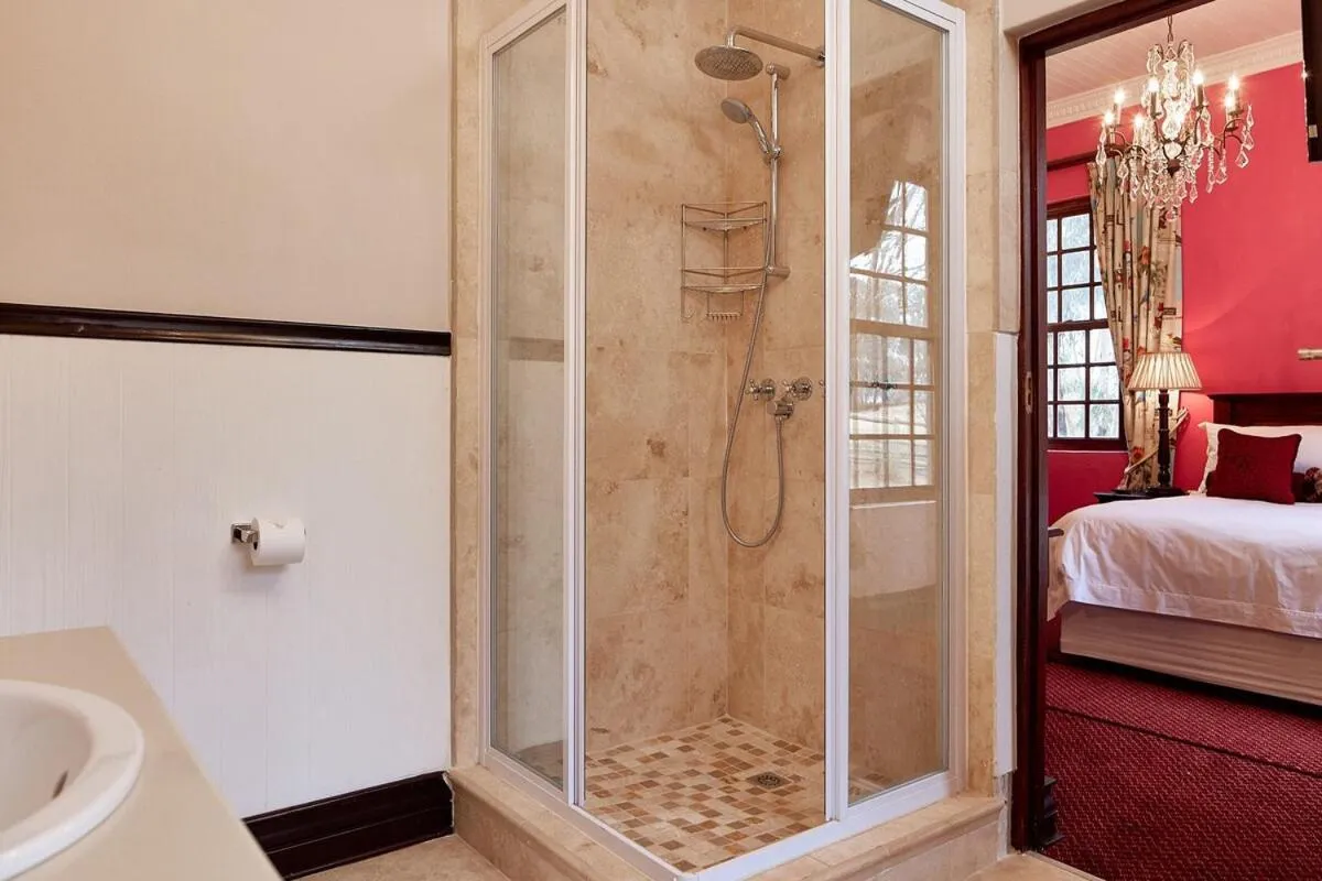 Shower, Bed in Bergview Farm Cottage by First Private Stays