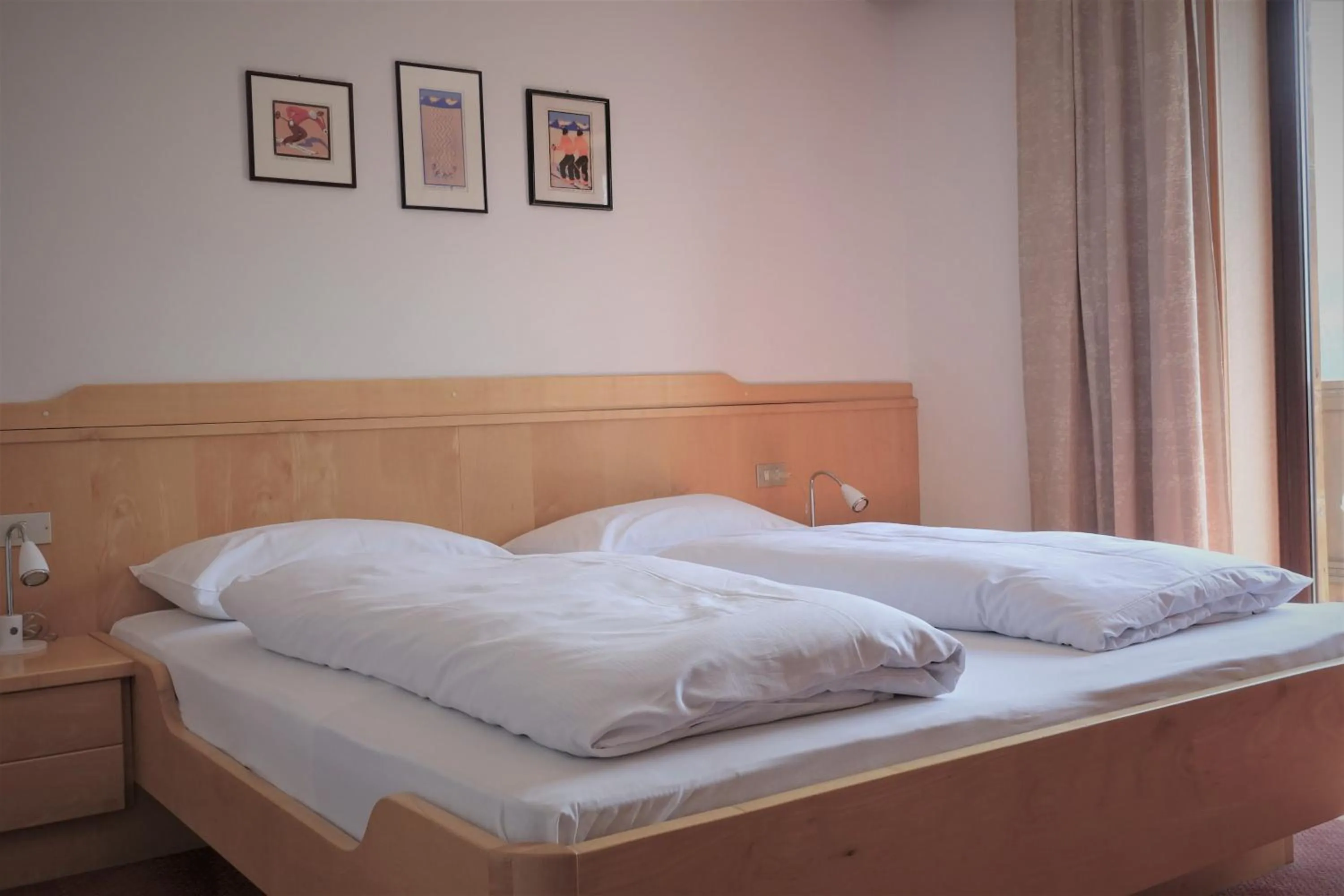 Bed in Pension Dolomieu