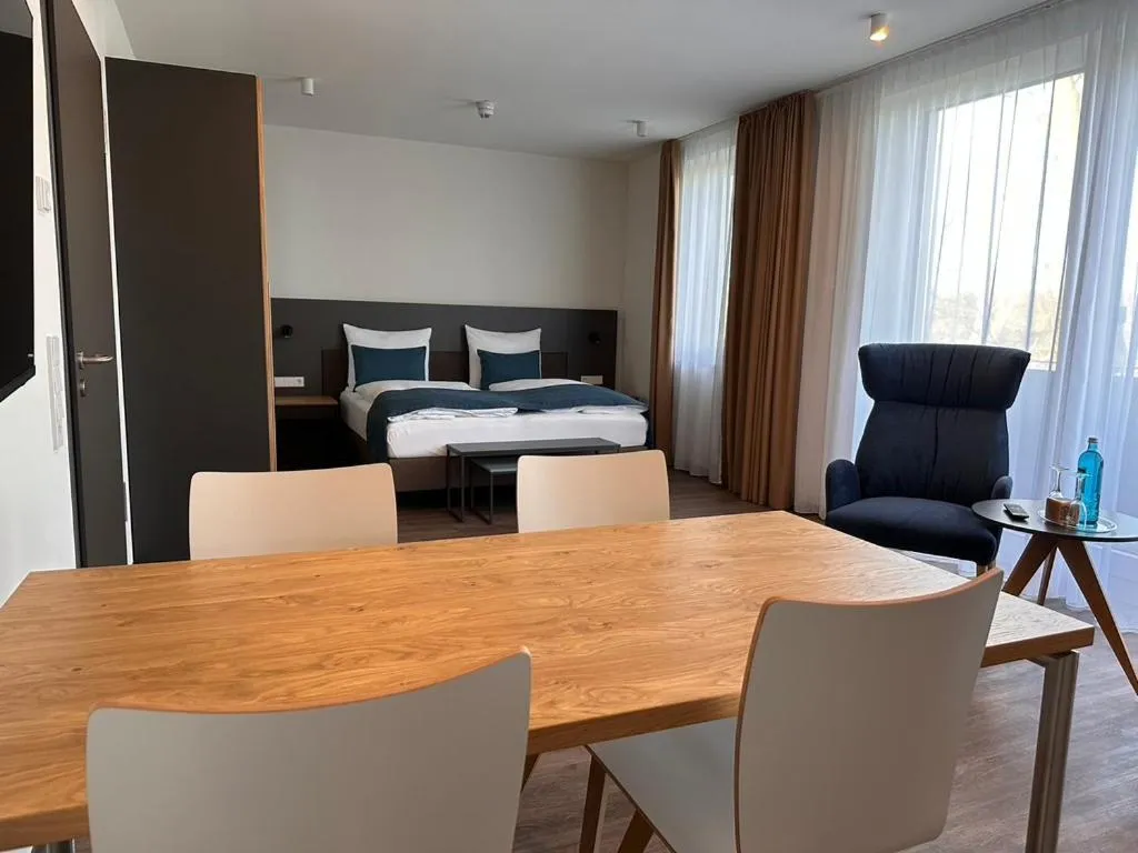 Seating area, Bed in Hotel Schöne Aussicht