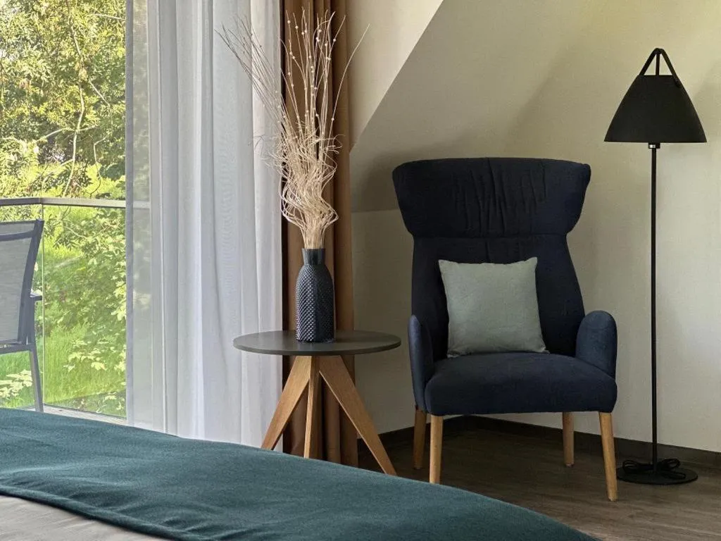 Seating area, Bed in Hotel Schöne Aussicht