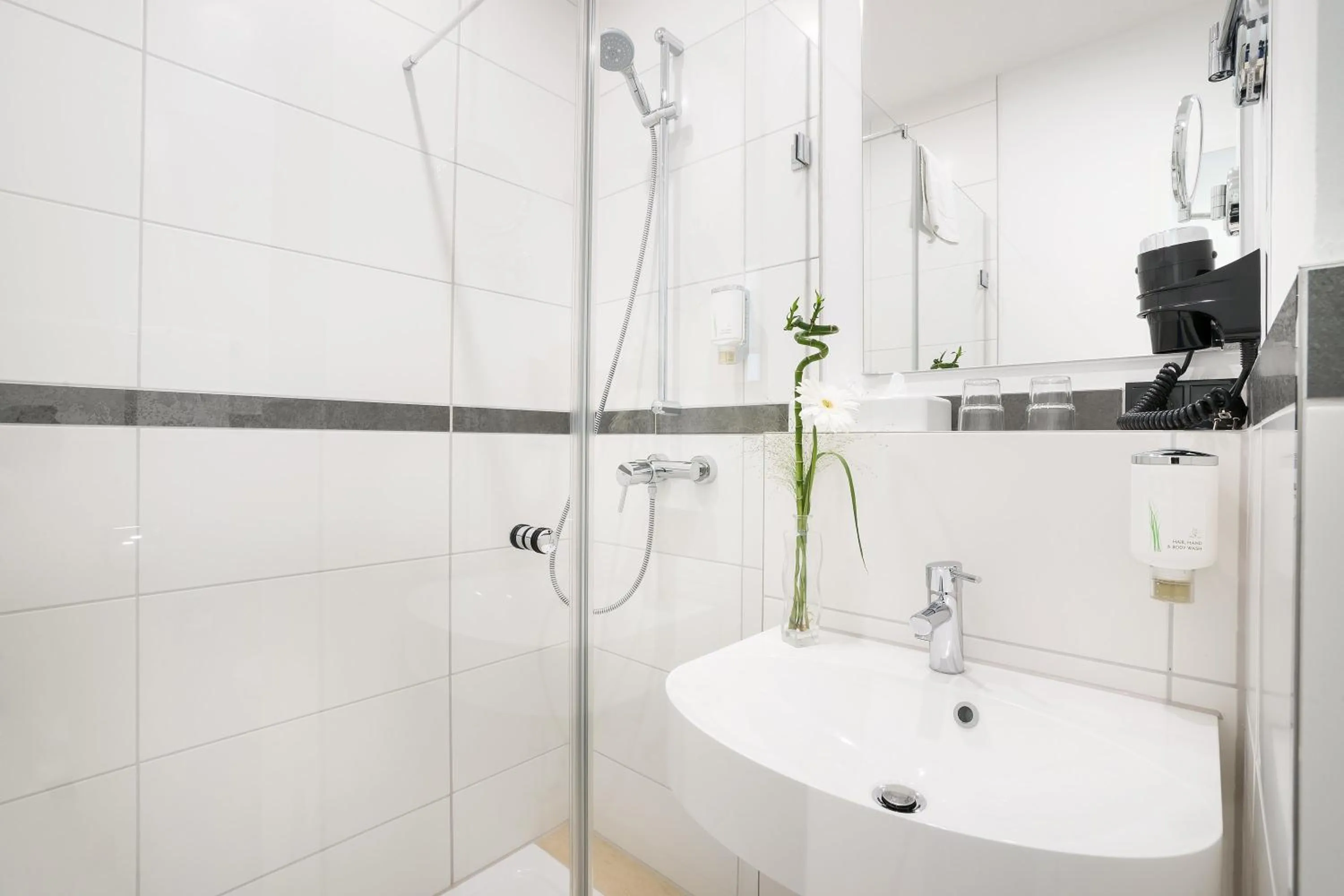 Bathroom in Garner Hotel Cologne Porz - Airport by IHG