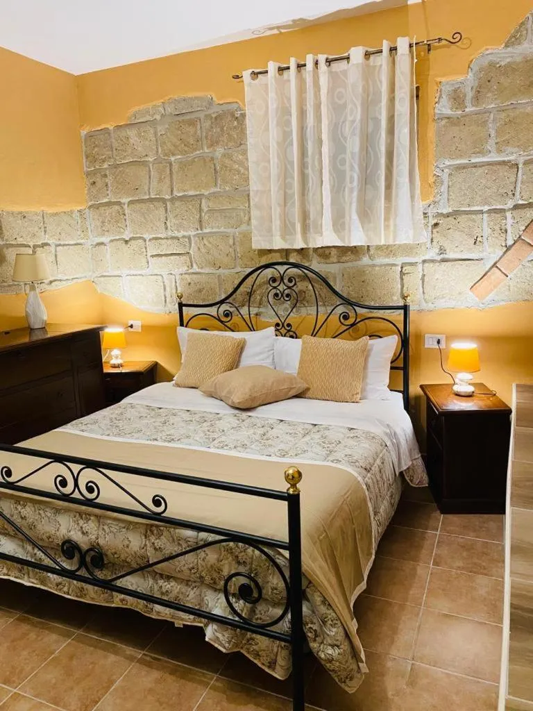 Bed in B&B il giardino di Eolo