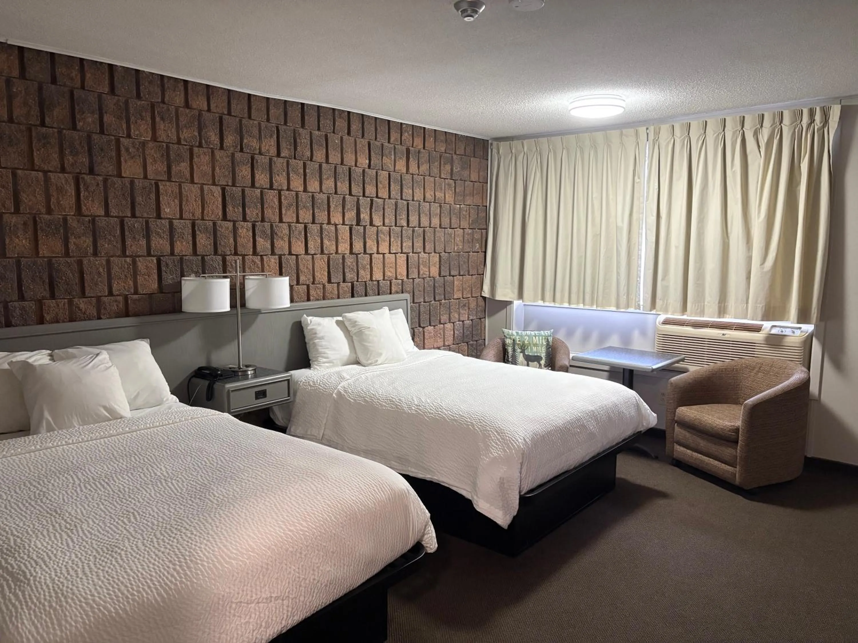 Bed in Companion Hotel Motel