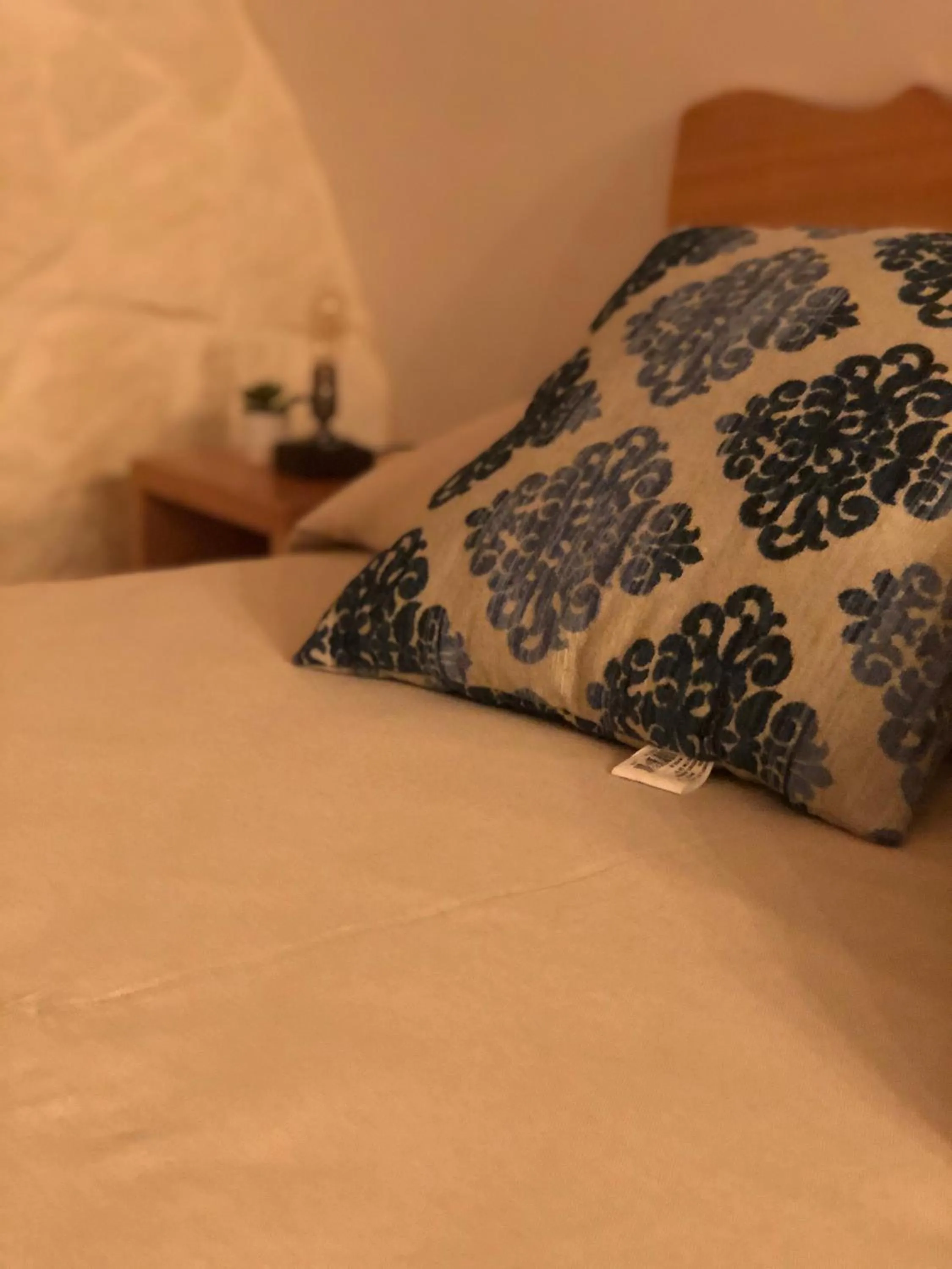 Bed in Il Galletto Viola, luxury room & suite