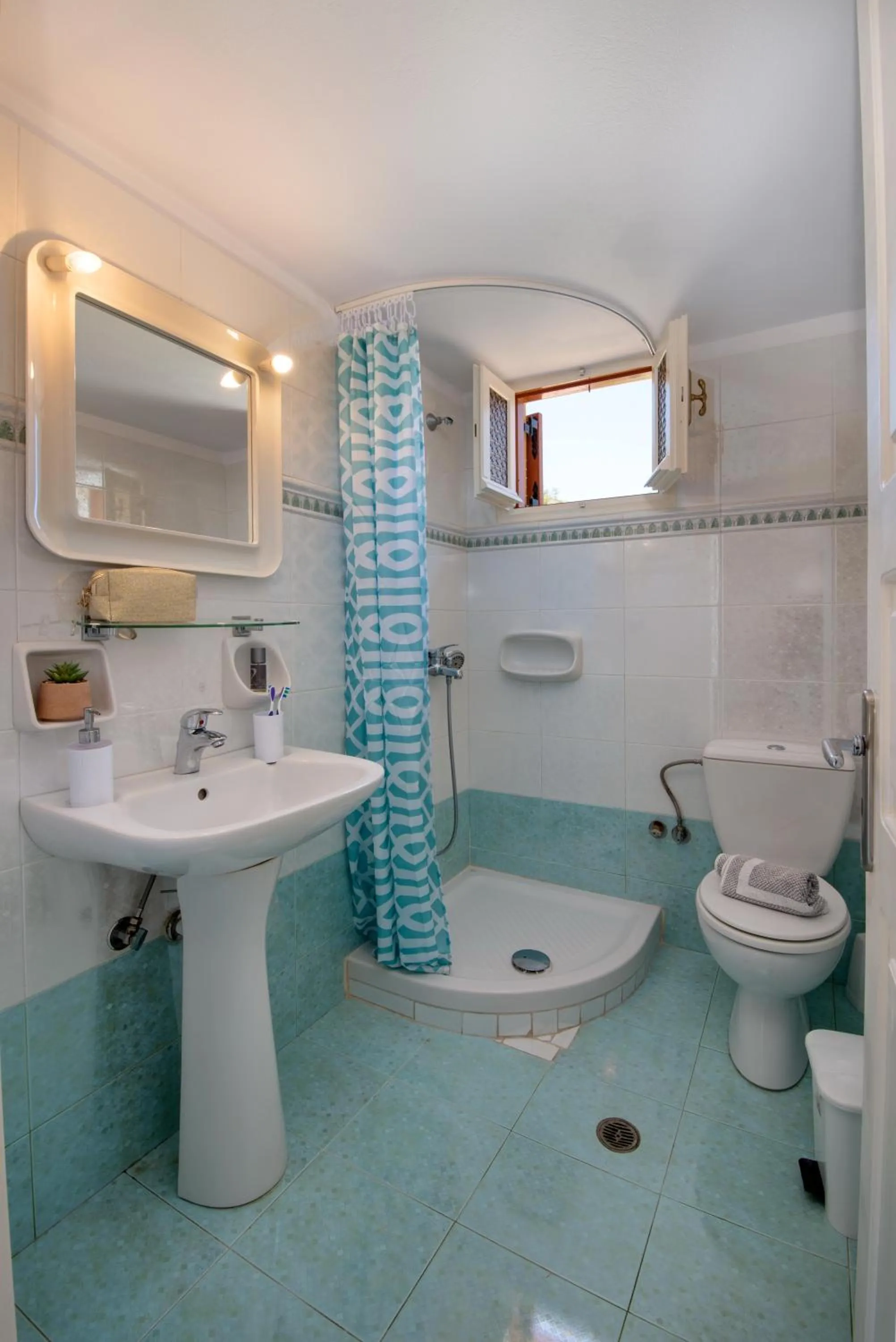 Bathroom in LIvadi Studios with Pool