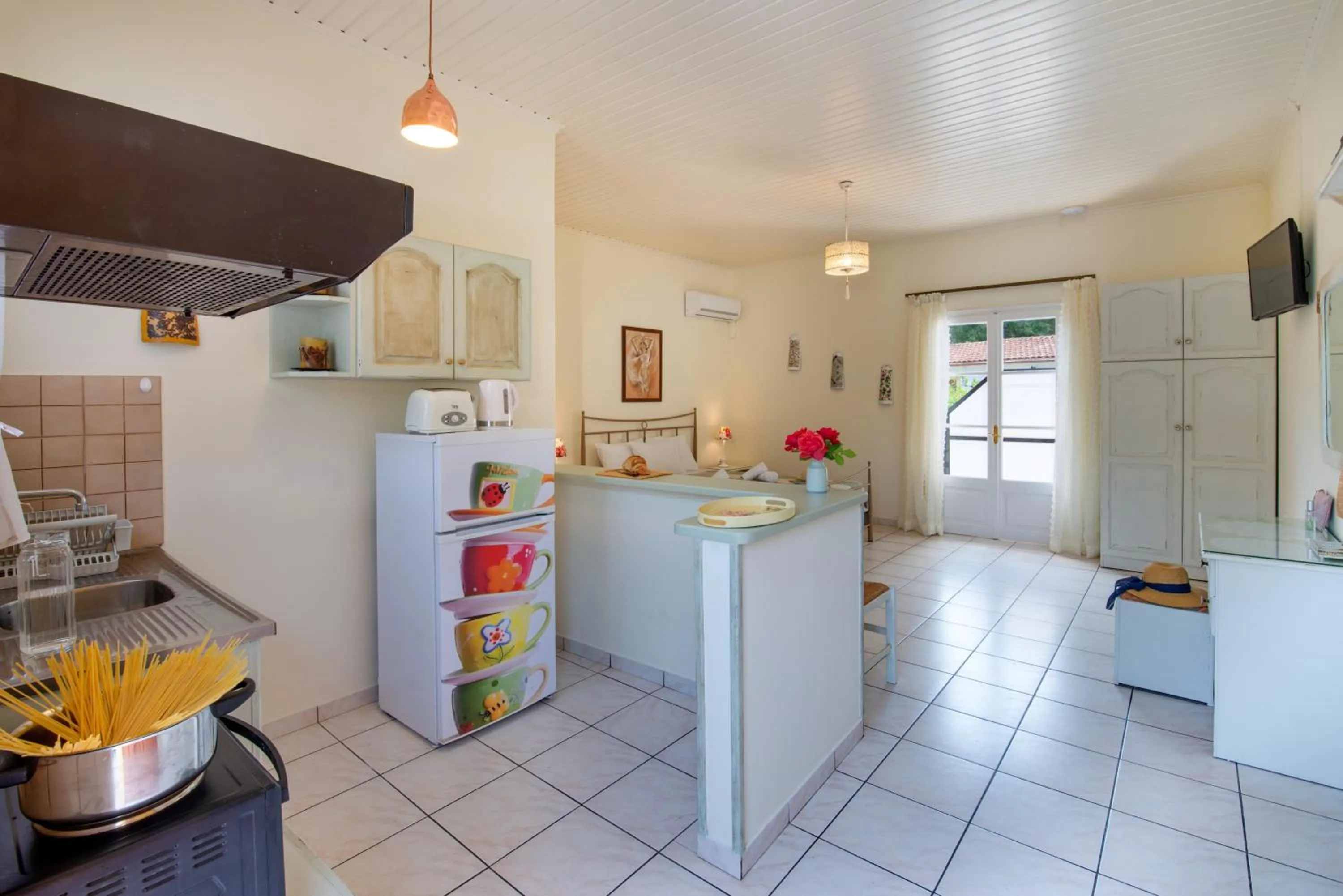 Kitchen or kitchenette in LIvadi Studios with Pool