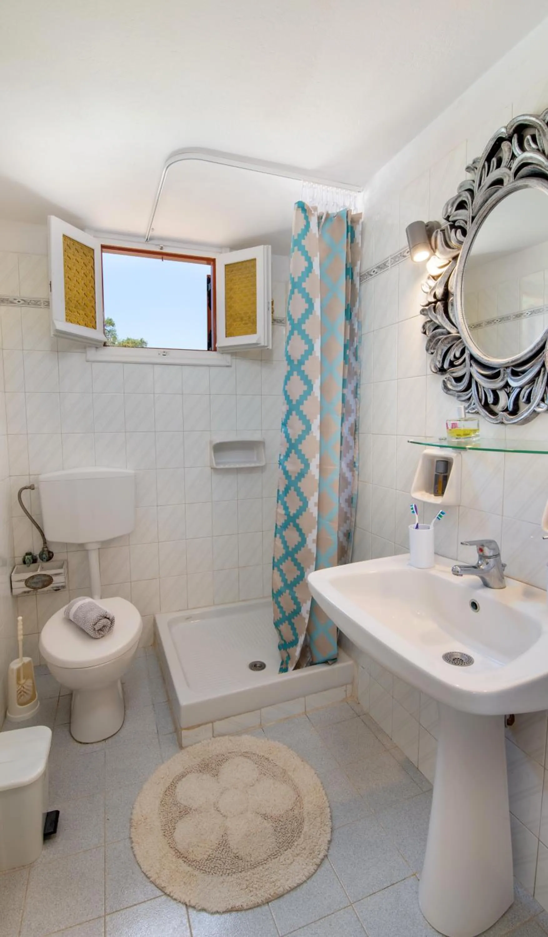 Bathroom in LIvadi Studios with Pool