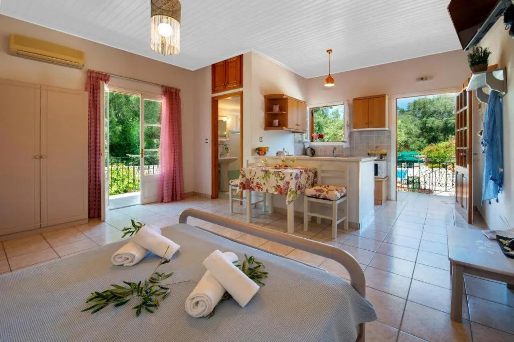 Toilet in LIvadi Studios with Pool