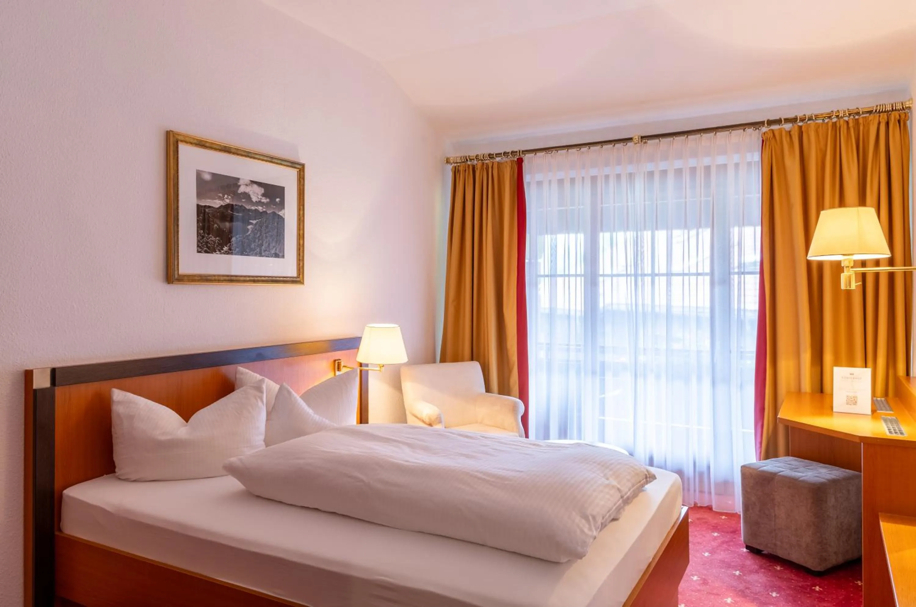 Photo of the whole room, Bed in Königshof Hotel Resort