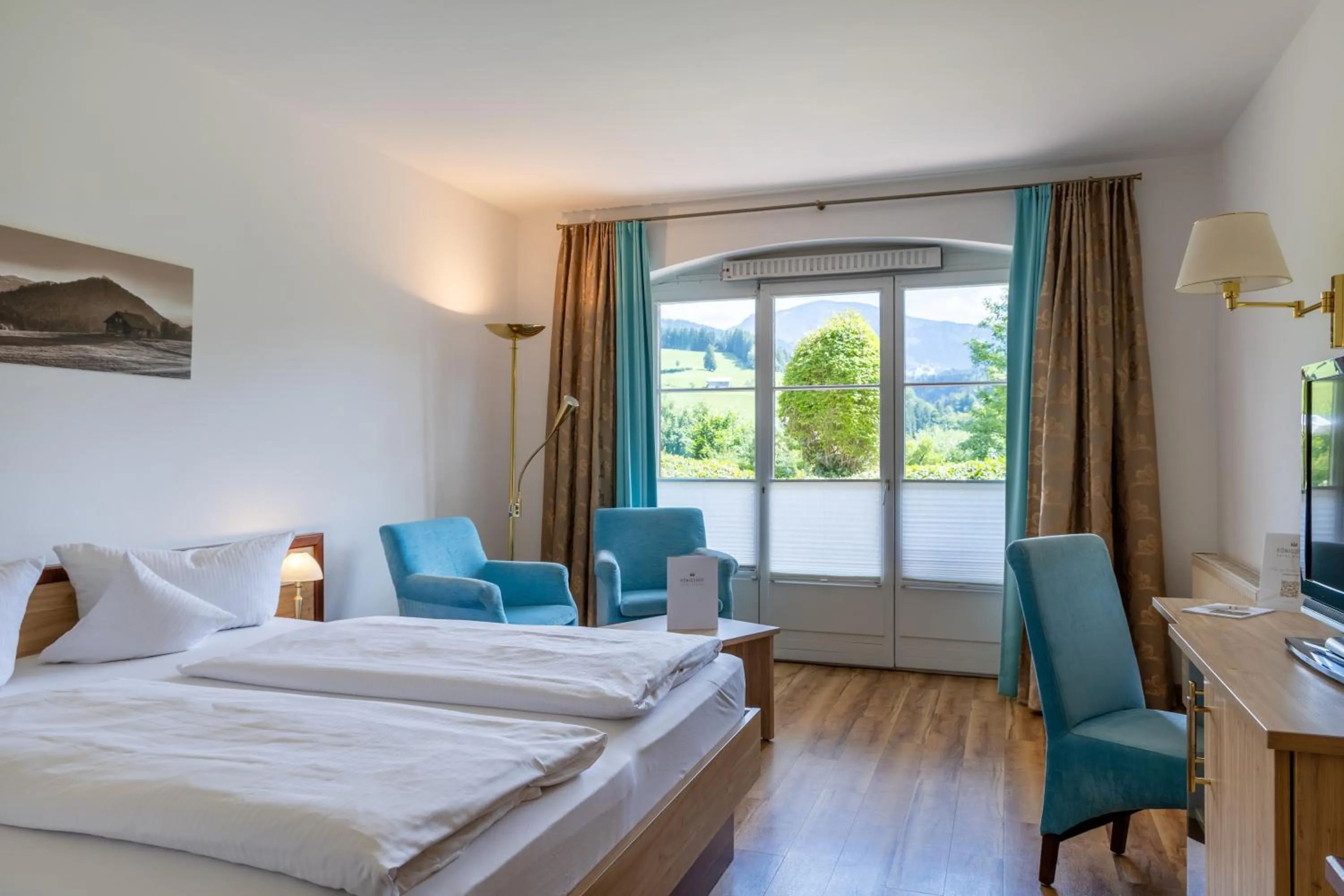 Photo of the whole room, Bed in Königshof Hotel Resort