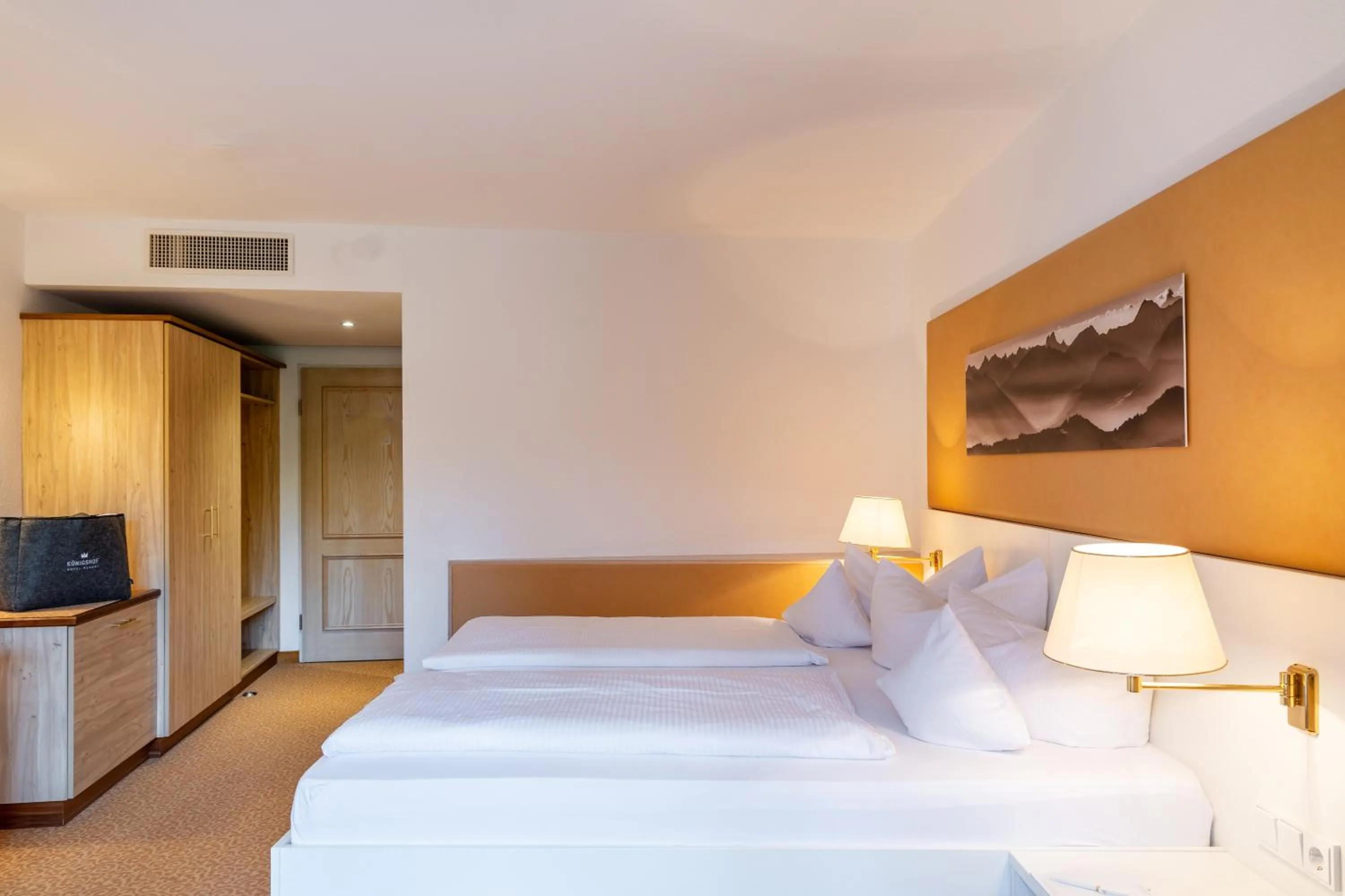 Photo of the whole room, Bed in Königshof Hotel Resort