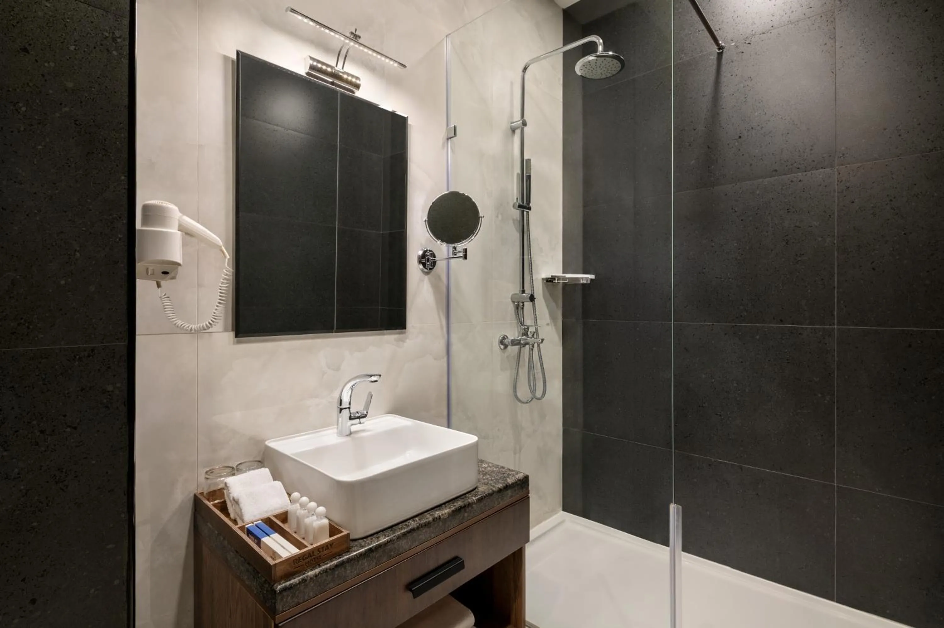 Bathroom in Regal Stay Hotel by HotelPro Group
