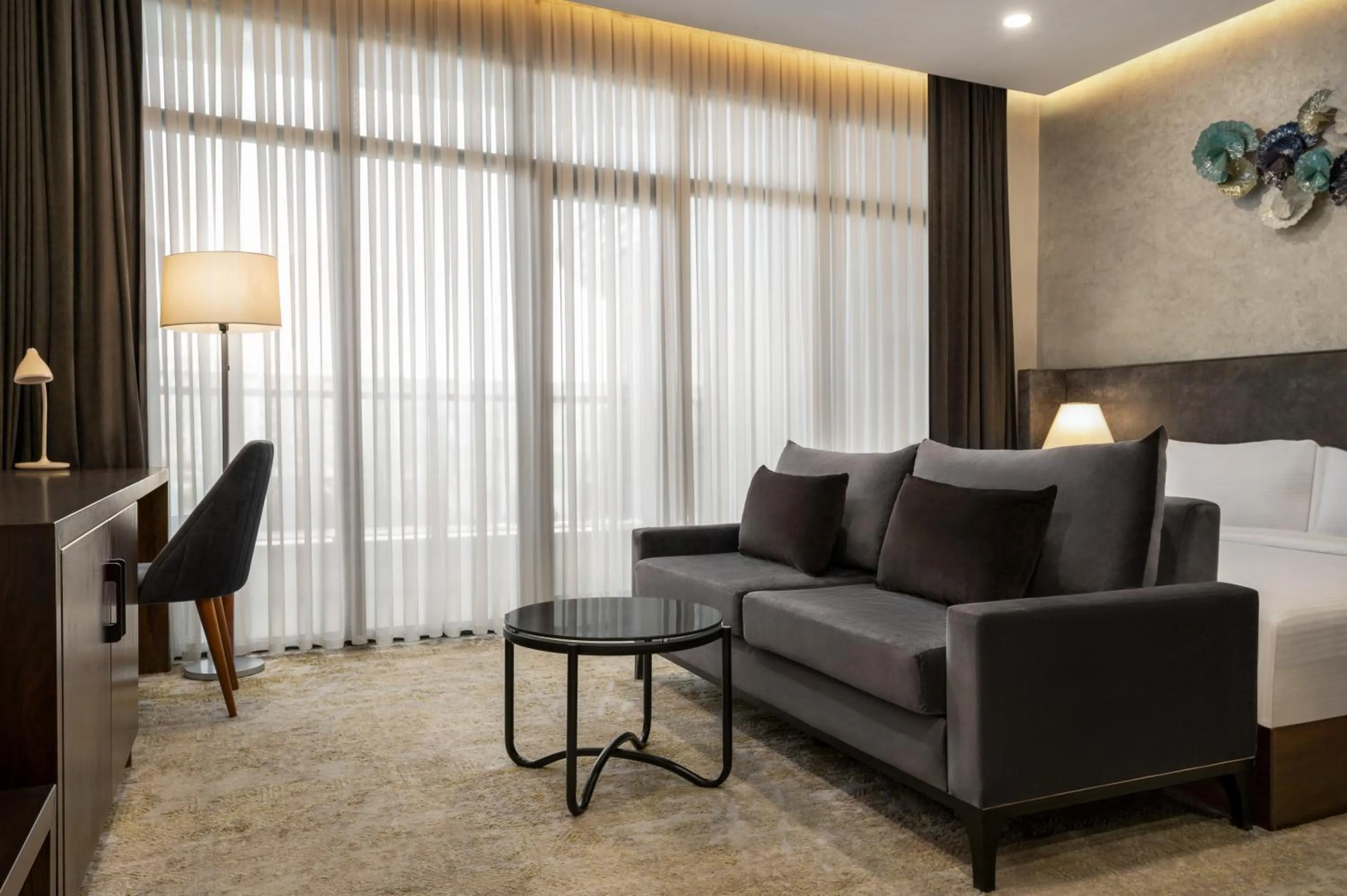 Photo of the whole room, Seating Area in Regal Stay Hotel by HotelPro Group