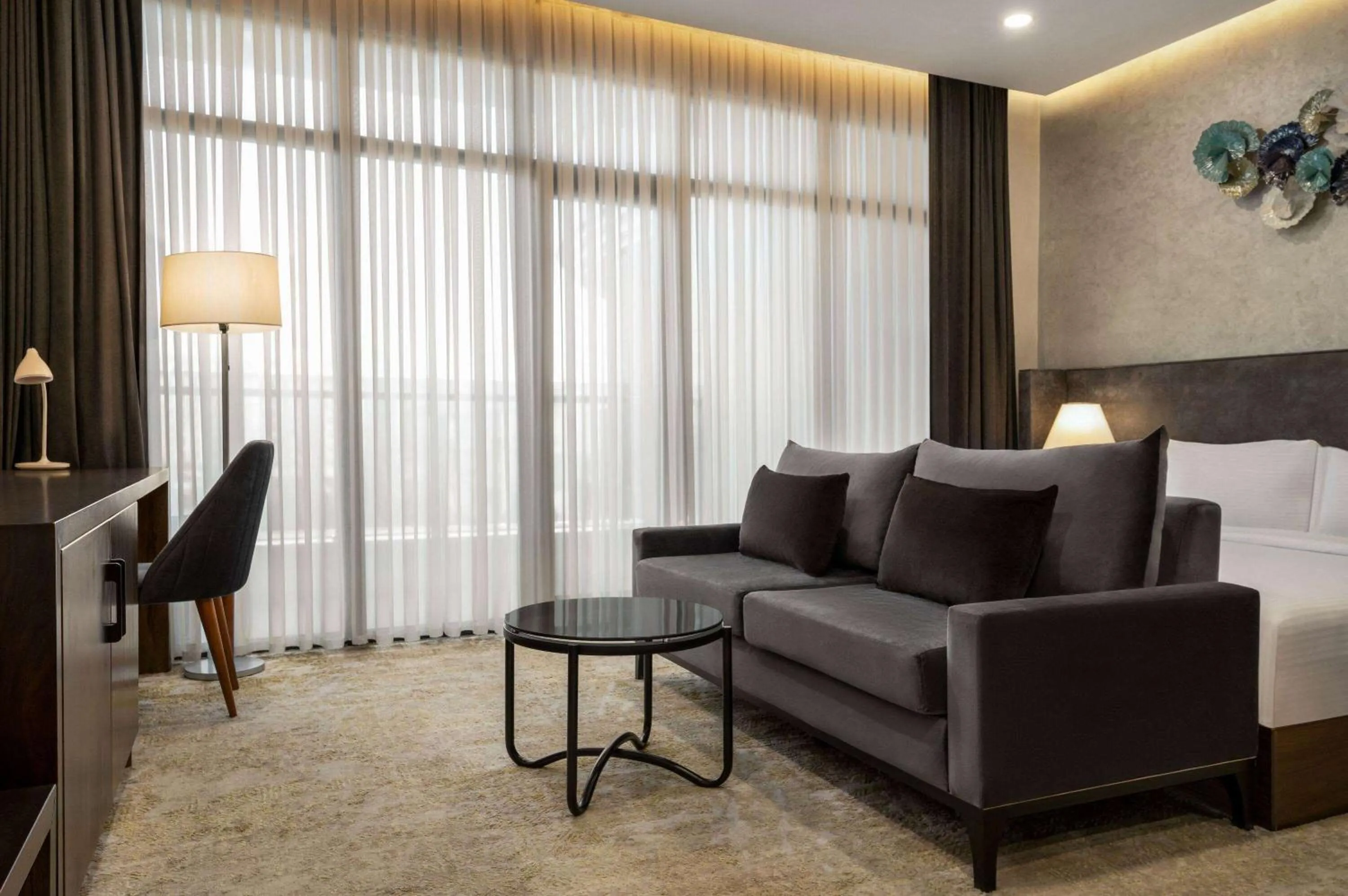 Photo of the whole room, Seating Area in Regal Stay Hotel by HotelPro Group