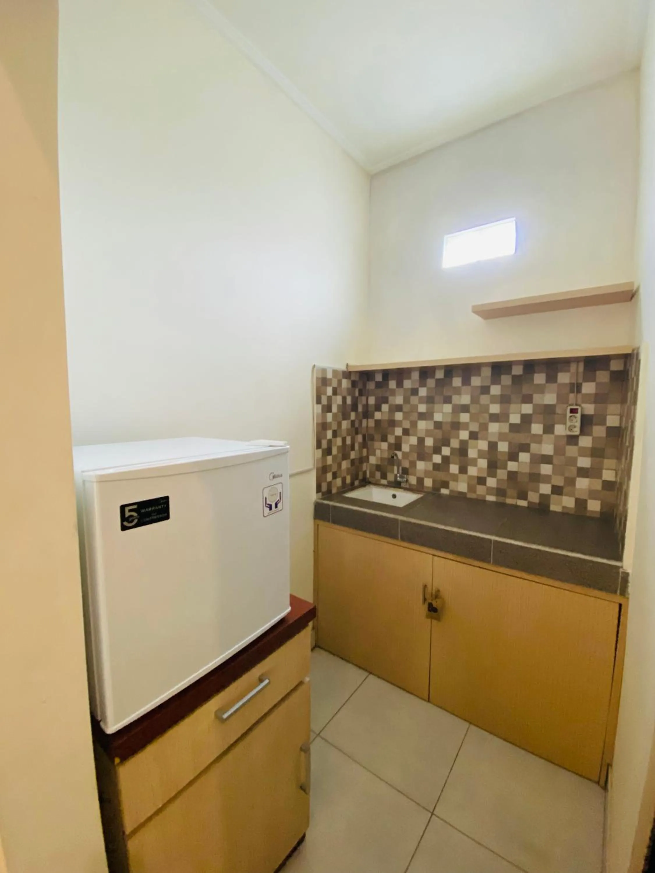 Kitchen or kitchenette in Mailaku House