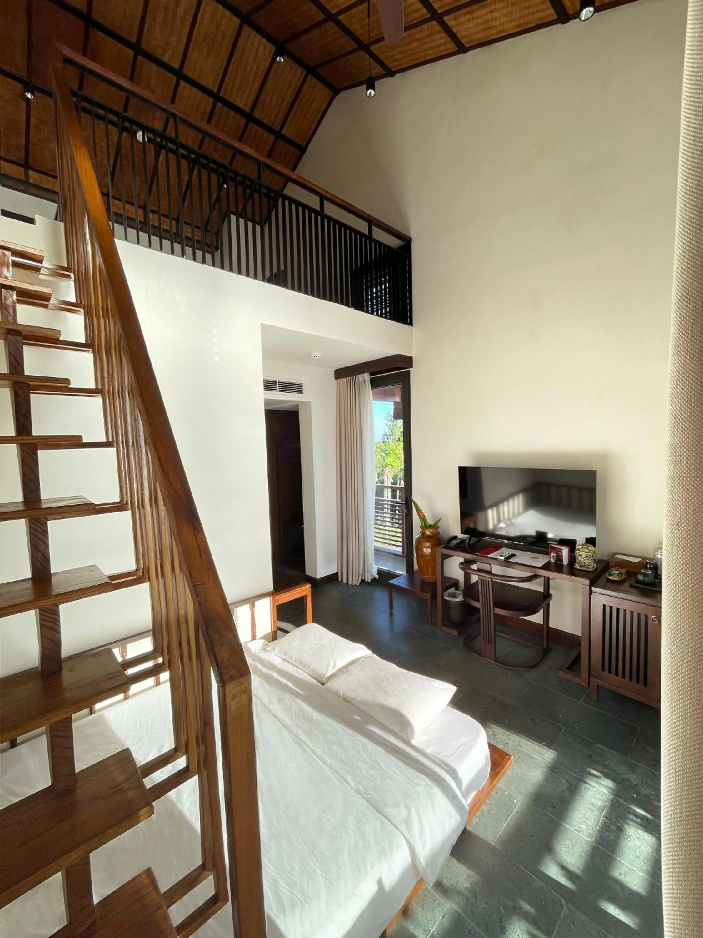 Living room, Bed in Nghê Prana Hotel and Spa Hoi An