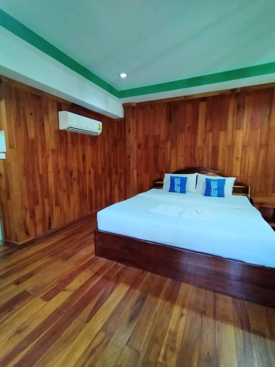 Bed in Palmsuay Resort