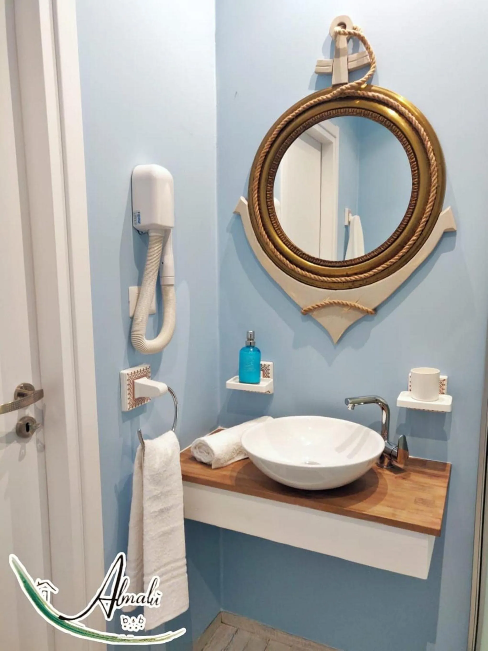 Bathroom in B & B Almalù