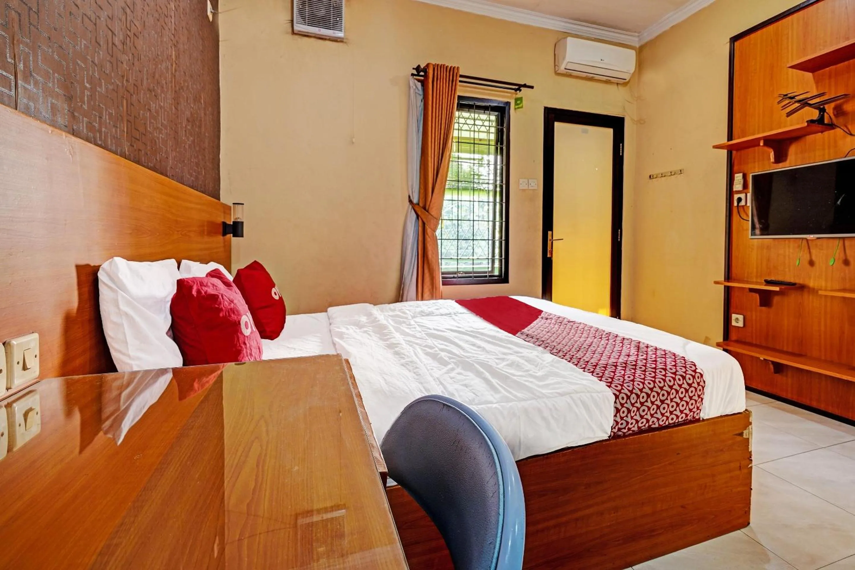 Bedroom in OYO 91547 Graha Hermawan Guest House Syariah