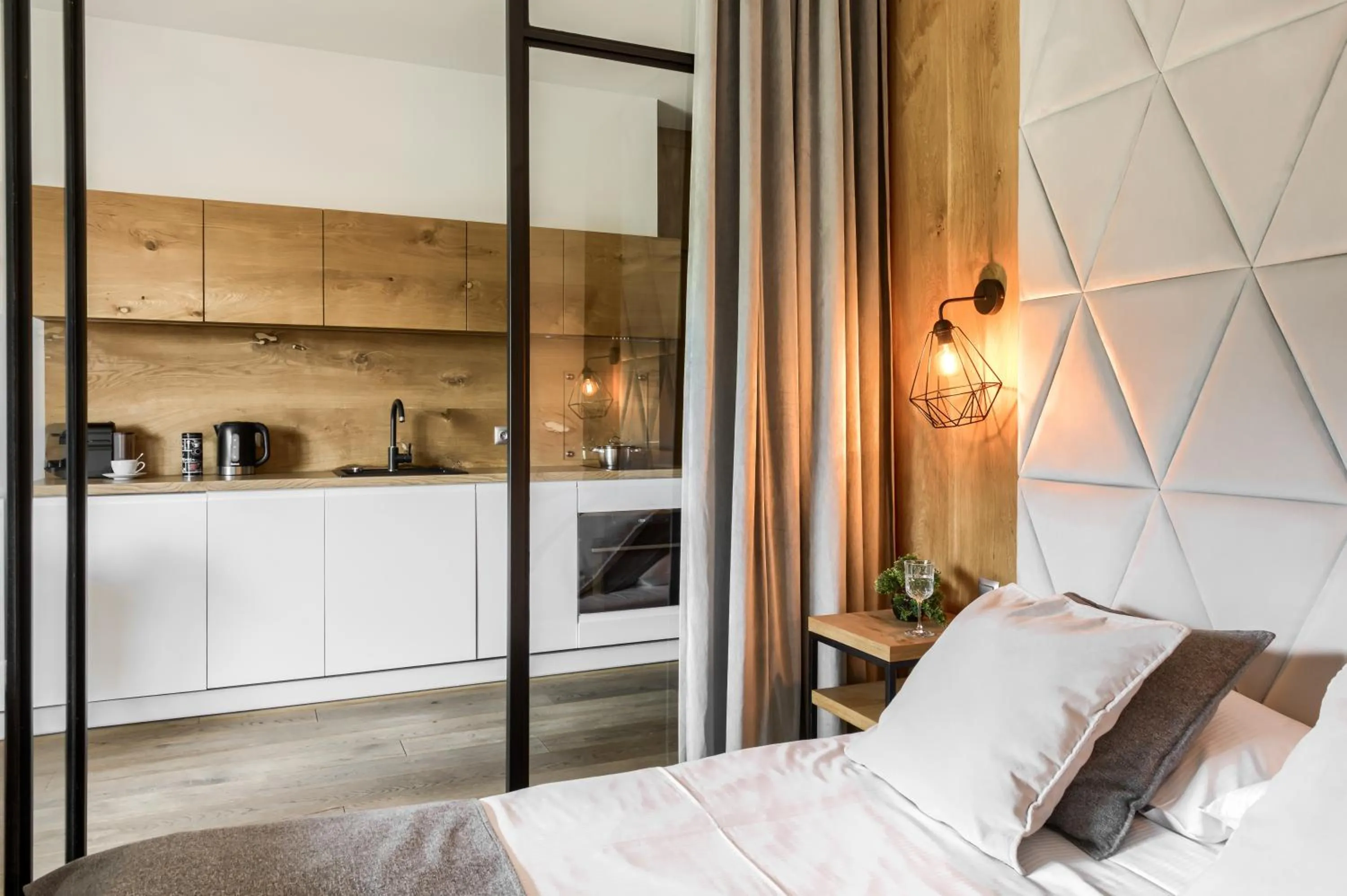 Kitchen or kitchenette, Bed in Tatra Resort & SPA