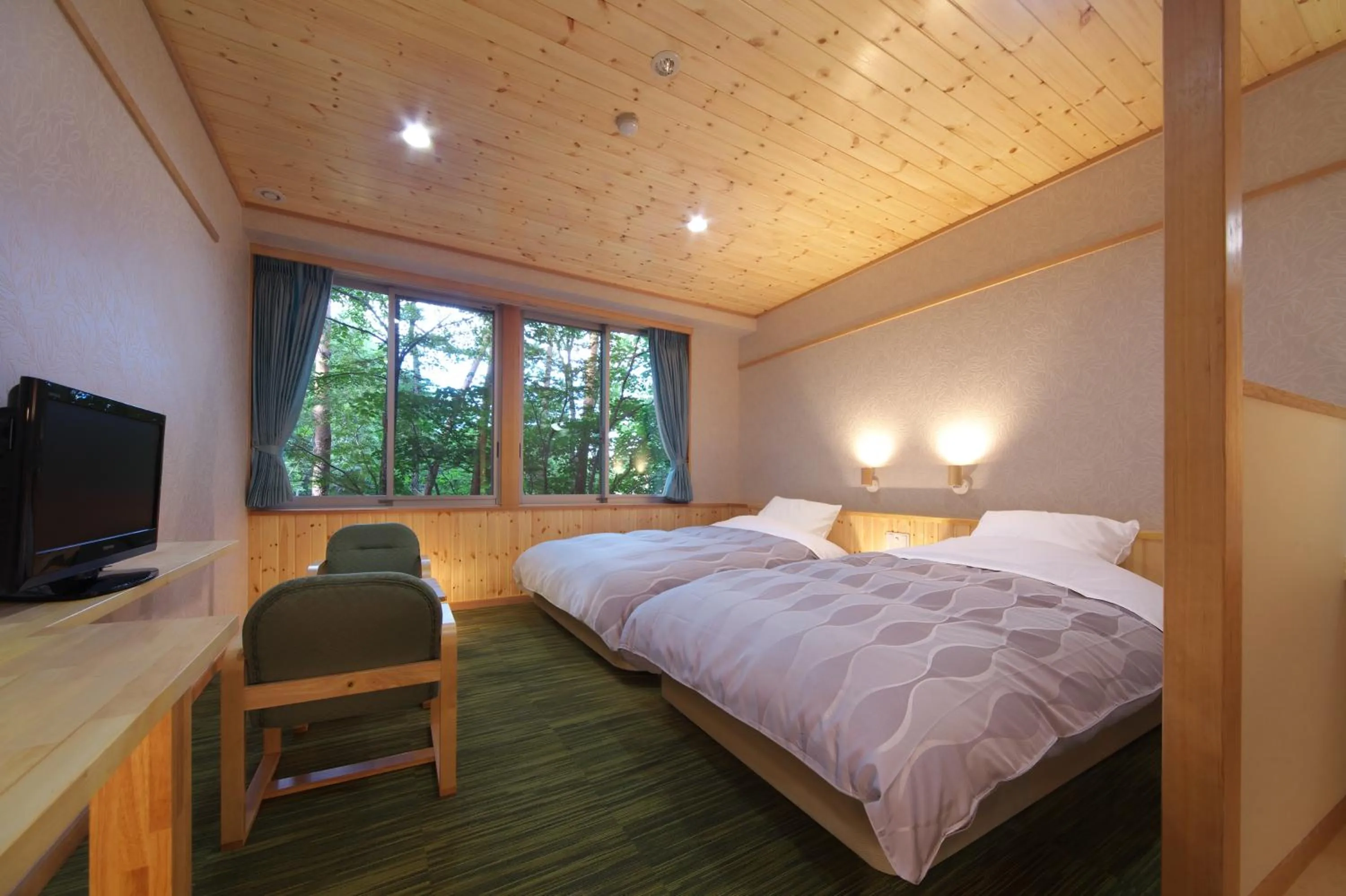 Photo of the whole room, Bed in Kusatsu Skyland Hotel