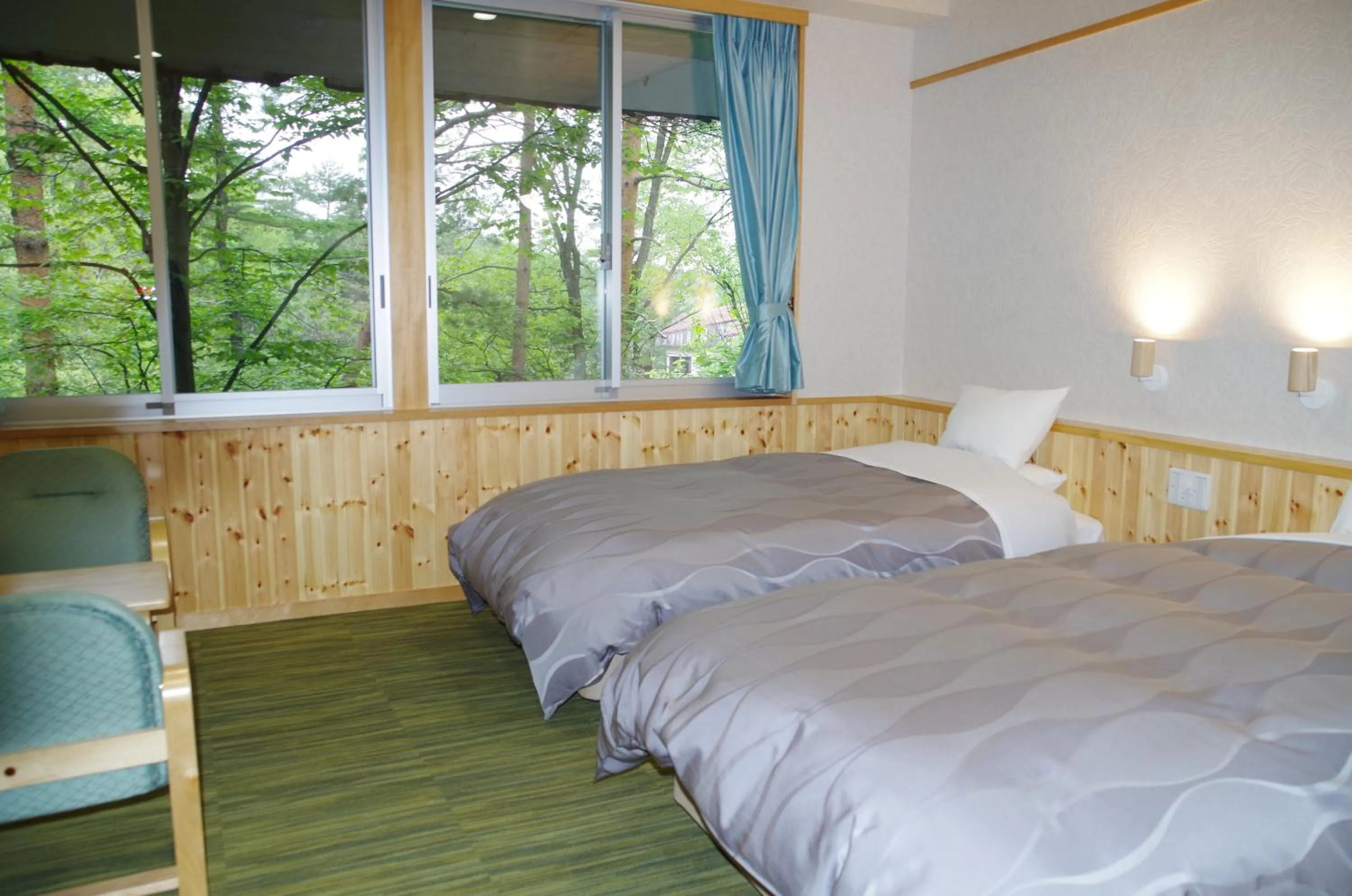 Photo of the whole room, Bed in Kusatsu Skyland Hotel