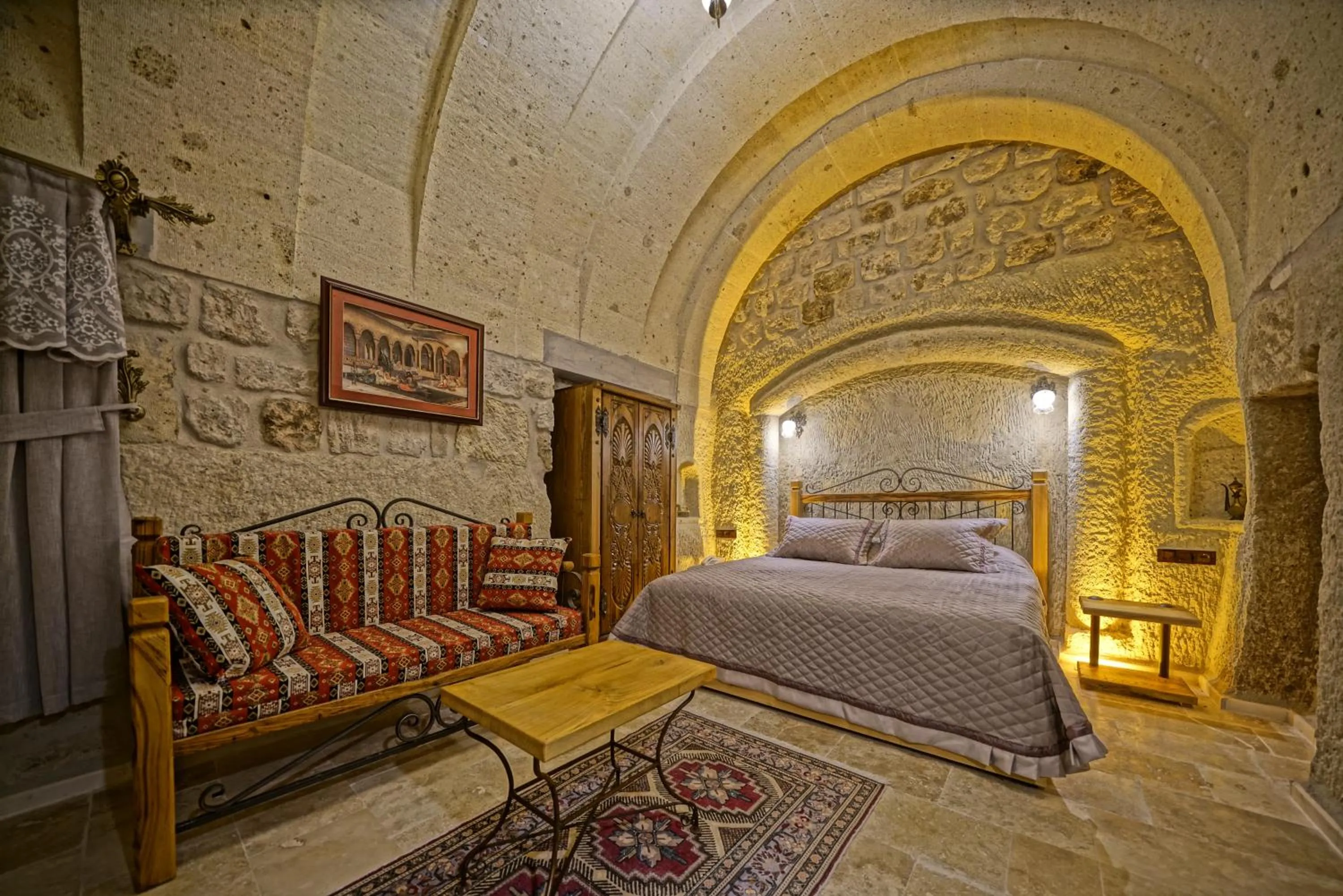 Living room, Bed in Cappadocia Cave Lodge