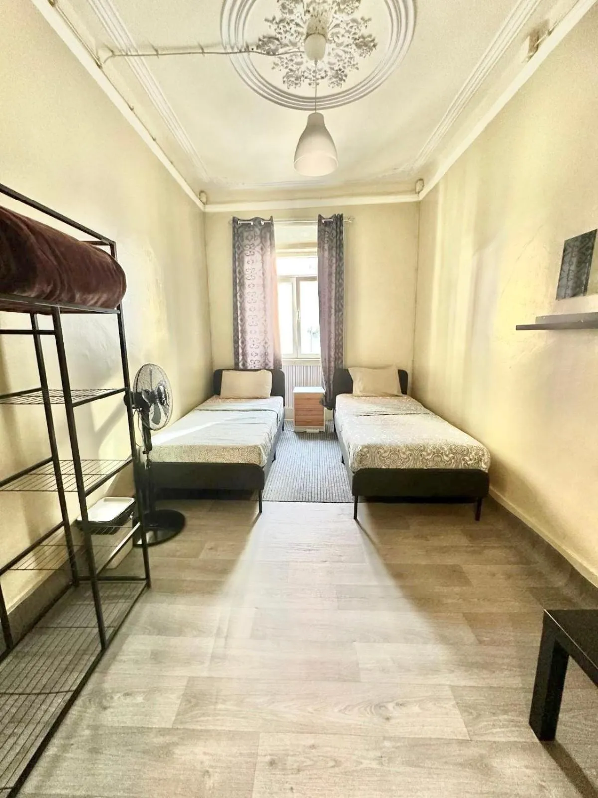 Bed in Sri-Indo Guest House