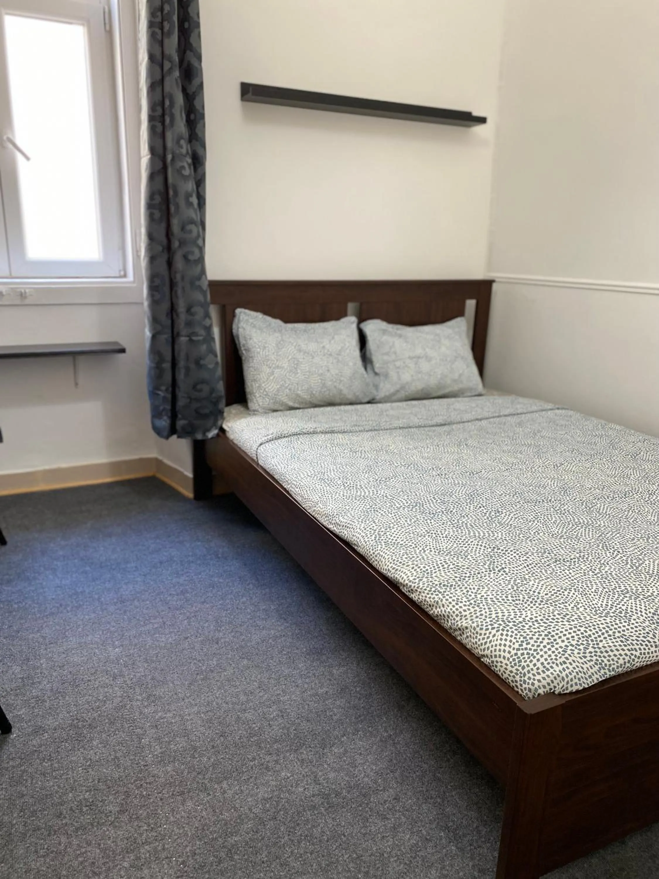 Bed in Sri-Indo Guest House