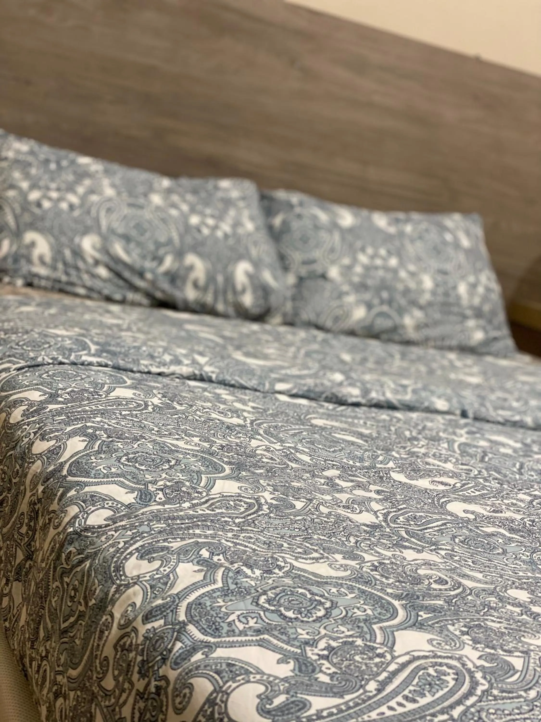 Bed in Sri-Indo Guest House