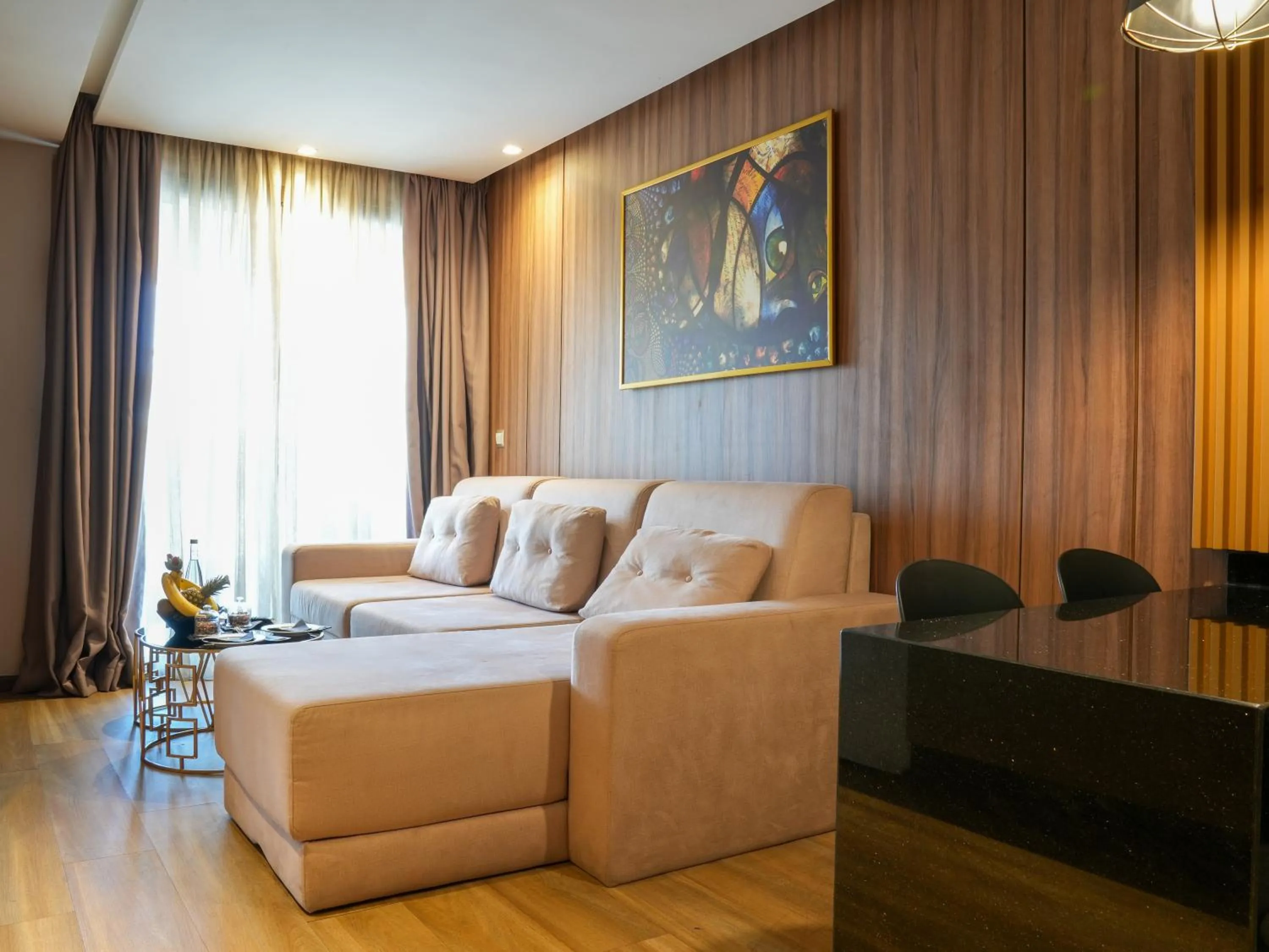 Living room in First Suites Hôtel