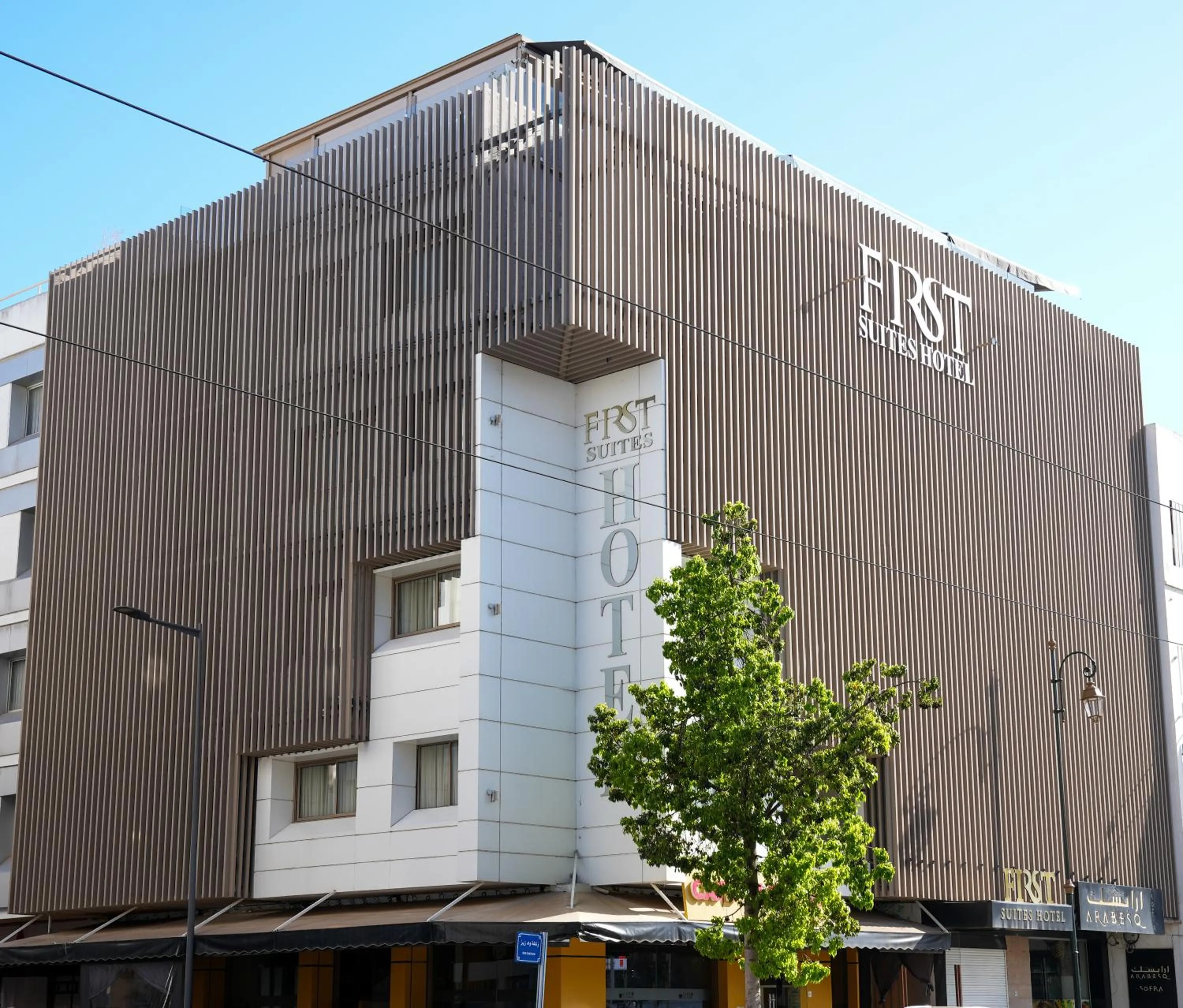 Property building in First Suites Hôtel