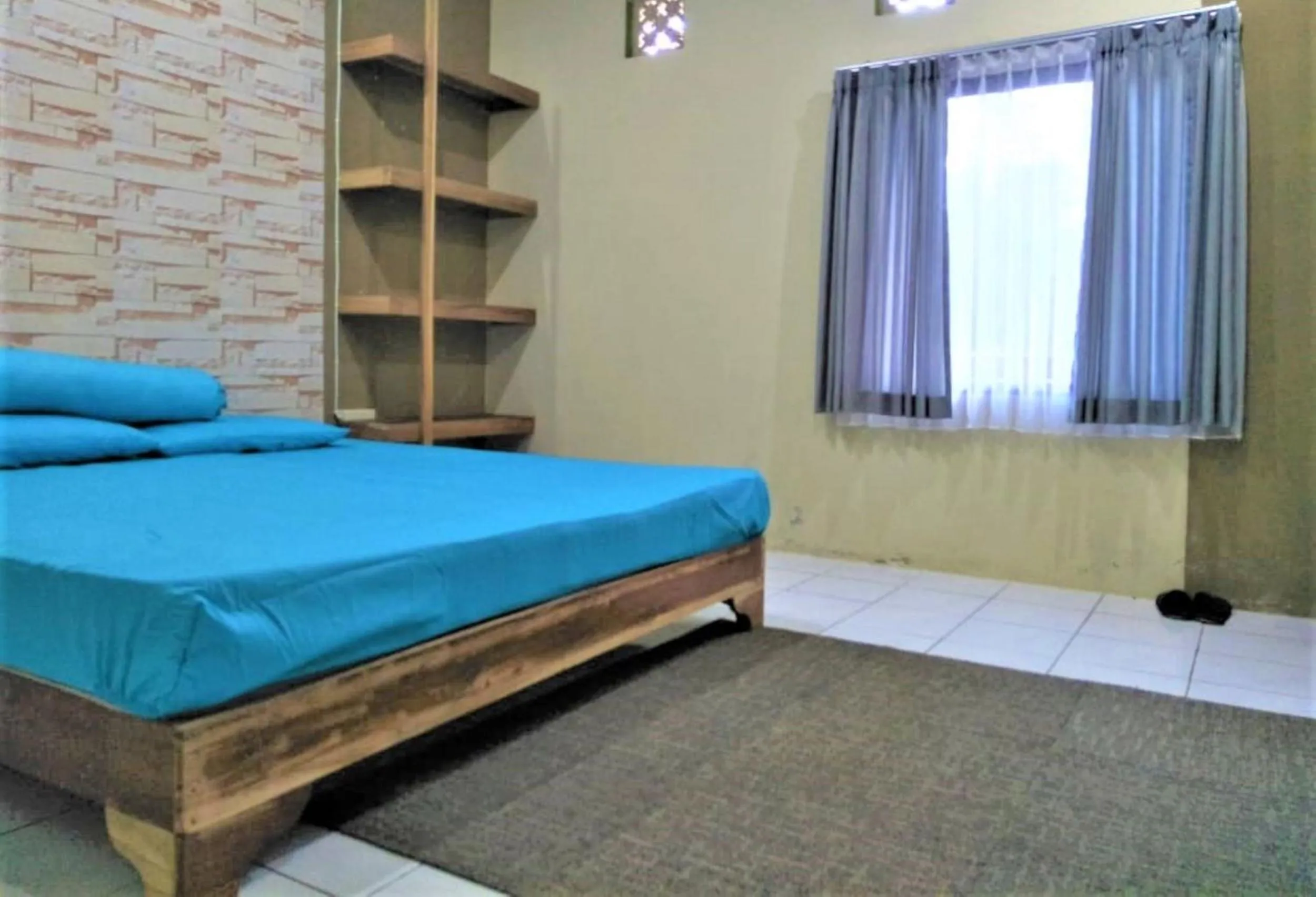 Bedroom, Bed in Penginapan Rudi Syariah
