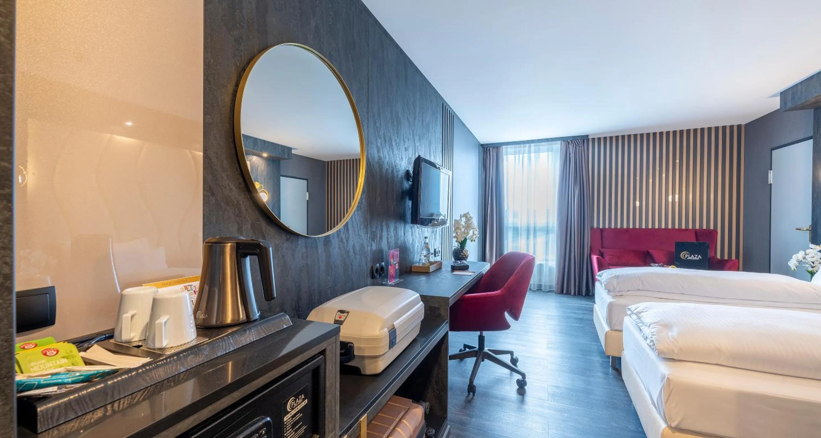 Photo of the whole room, Bed in PLAZA Premium Parkhotel Neu-Ulm