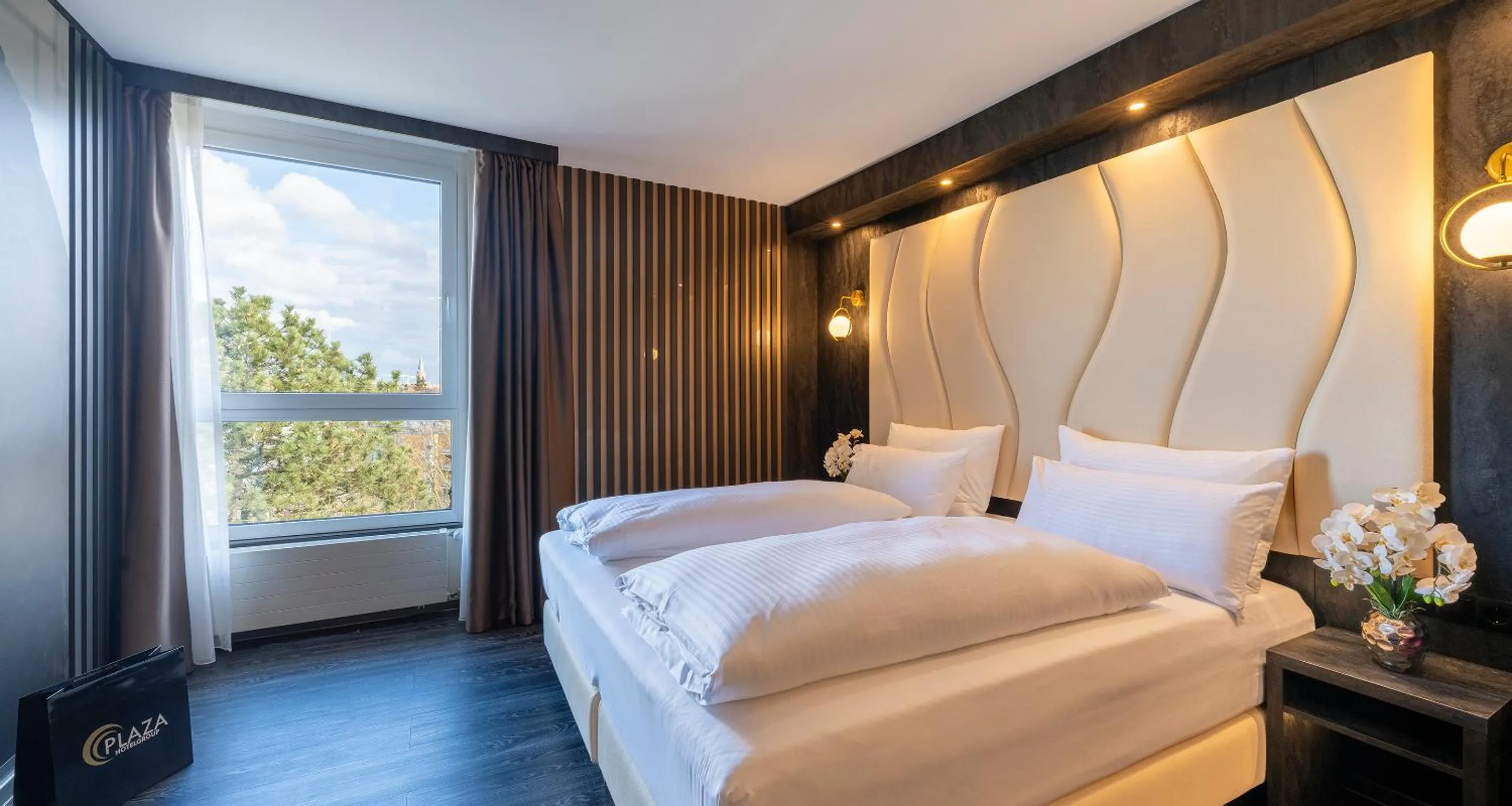 Photo of the whole room, Bed in PLAZA Premium Parkhotel Neu-Ulm