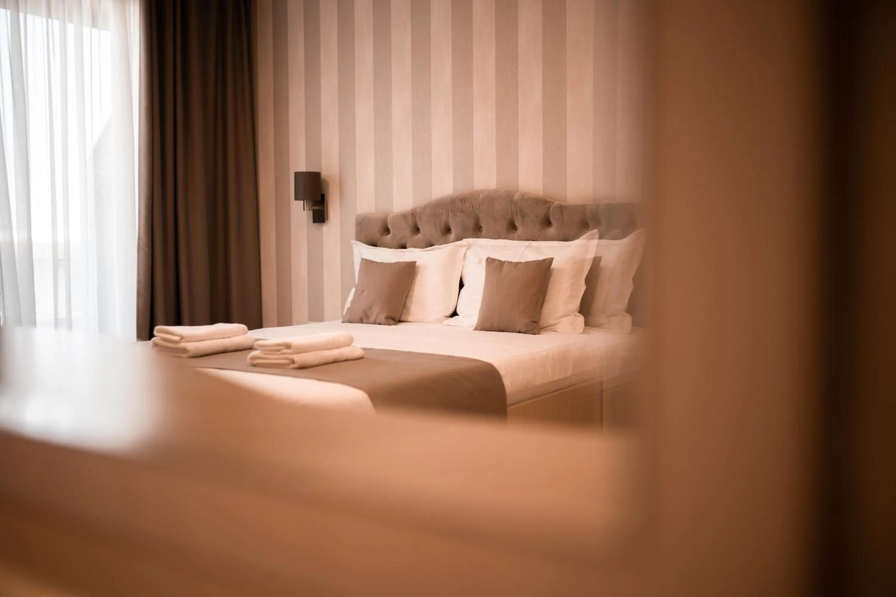 Bed in Hotel Grand Dedal