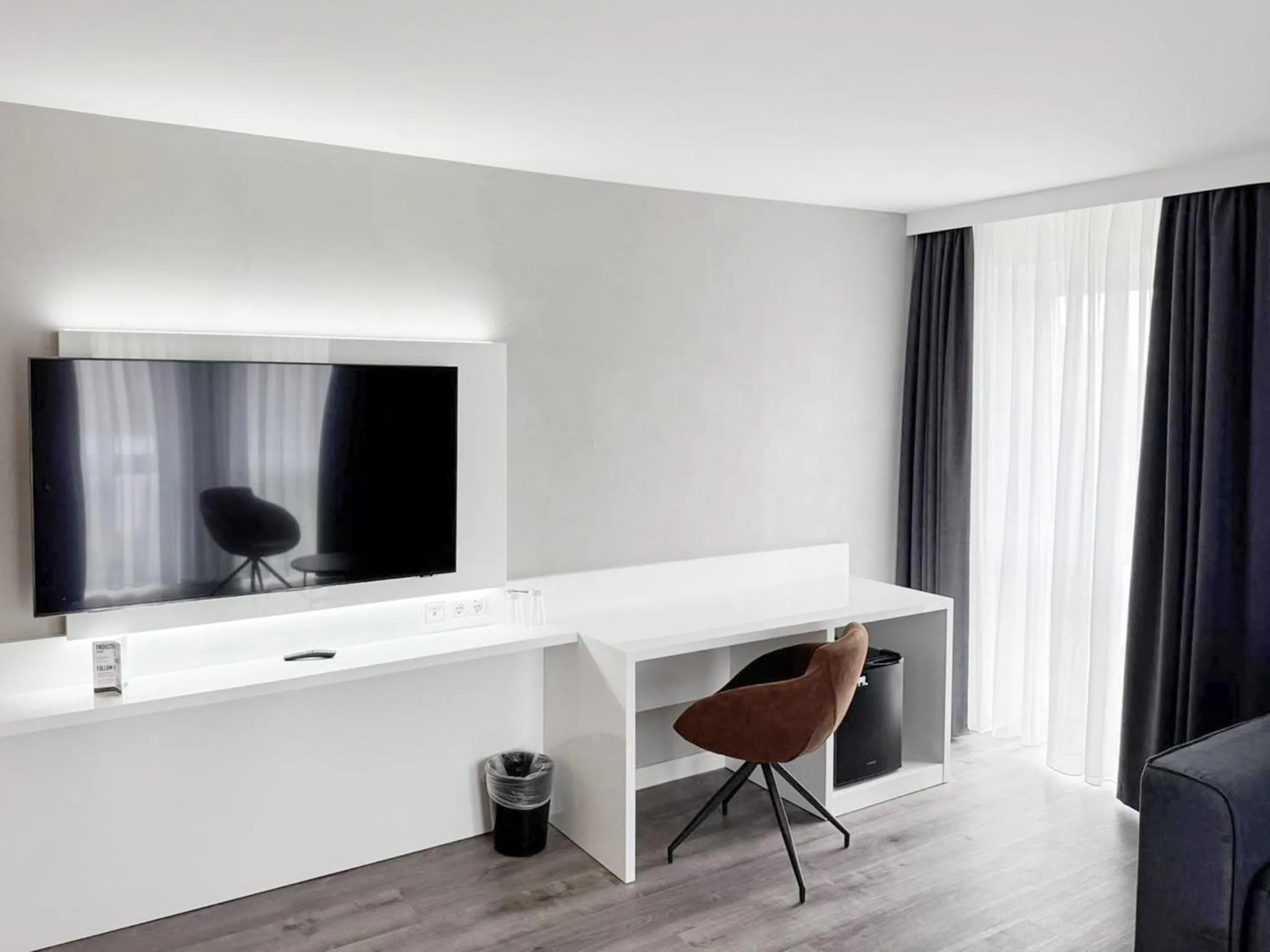 Photo of the whole room in DORMERO Hotel Weingarten