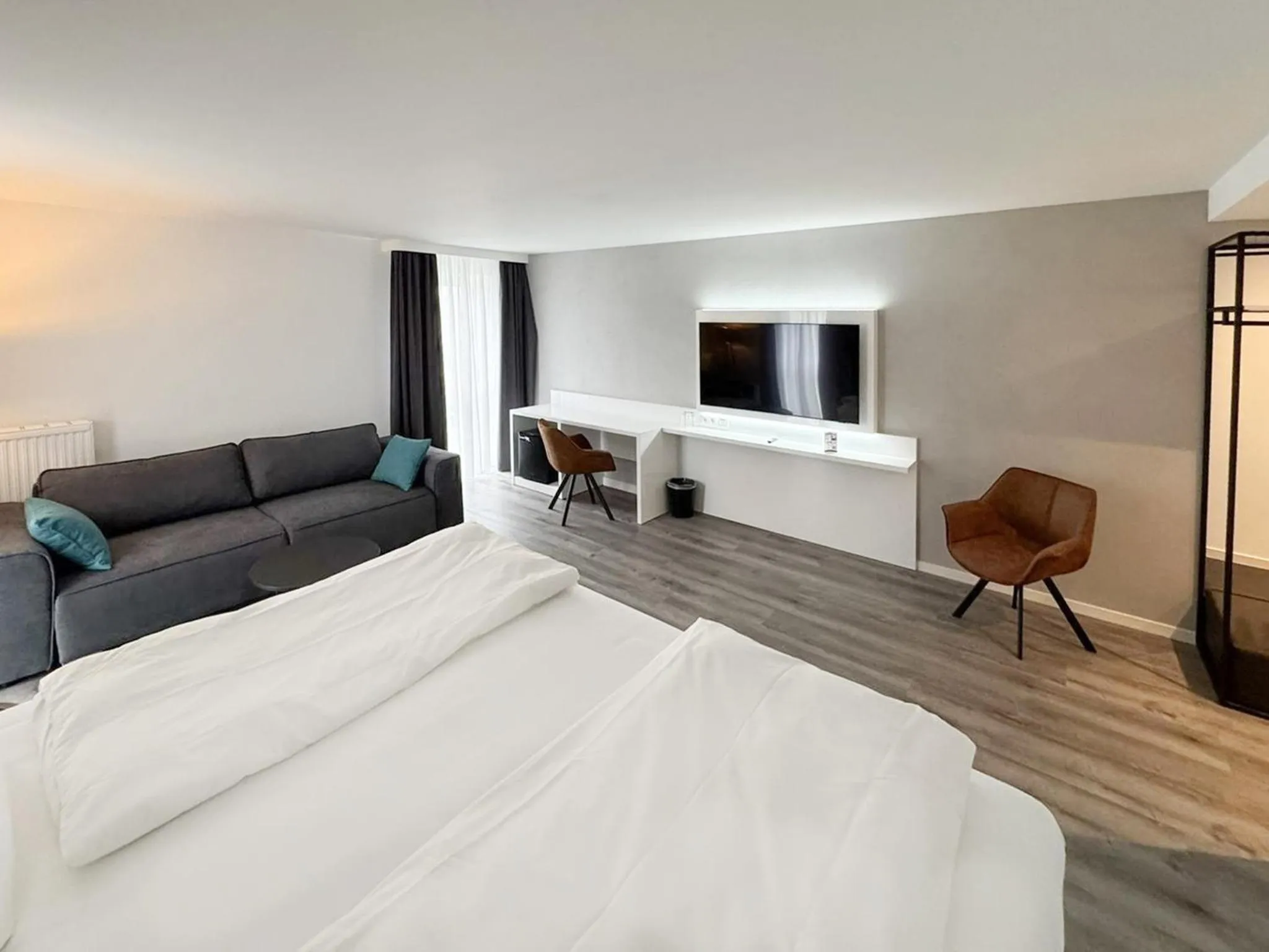 Photo of the whole room, Bed in DORMERO Hotel Weingarten