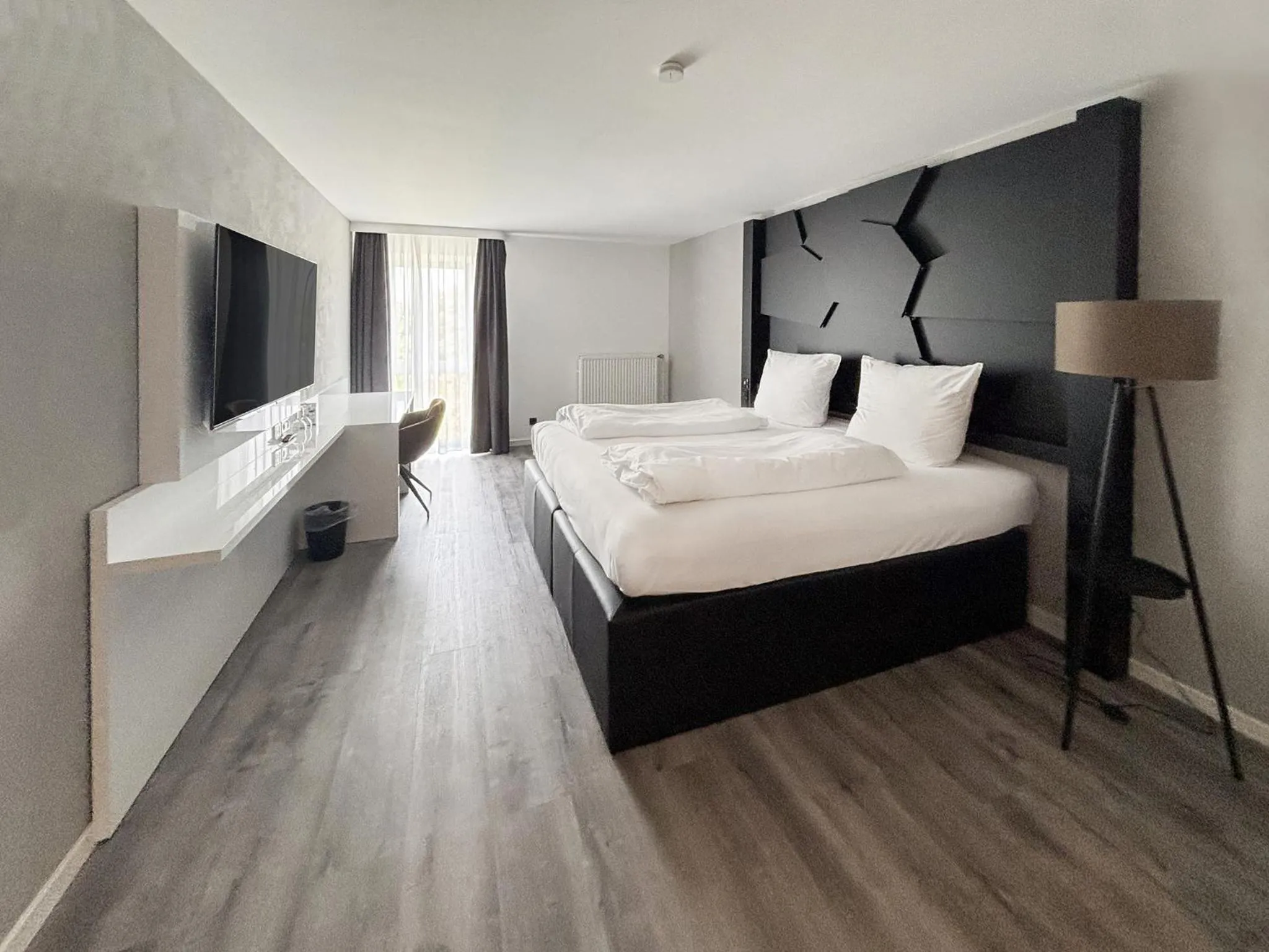 Photo of the whole room, Bed in DORMERO Hotel Weingarten